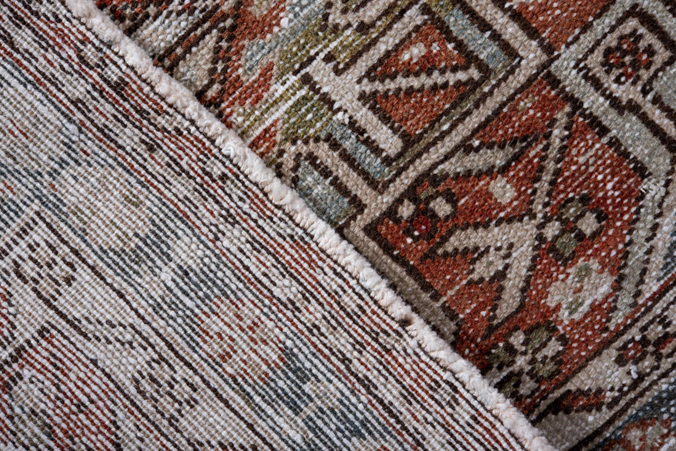 2' x 10' one-of-a-kind handmade antique Karaje runner rug. Color palette: rust, ivory, blue, brown, taupe, sage, terracotta