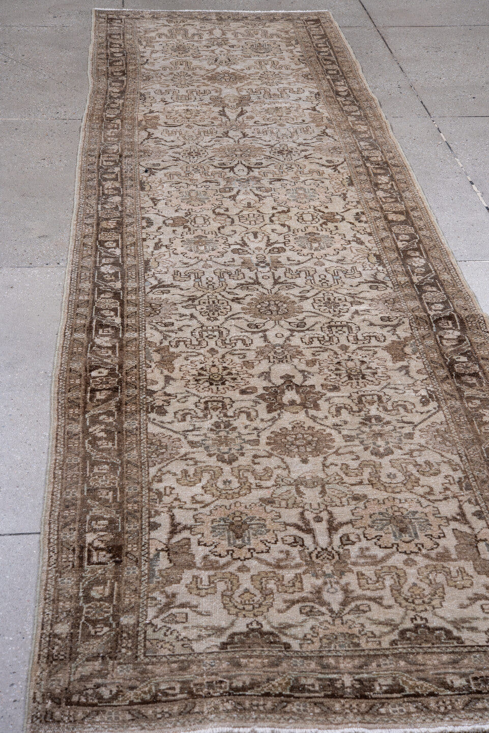 2' x 11' one-of-a-kind handmade antique Dargazin runner rug. Color palette: ivory, taupe, brown, beige, camel, greige, gray