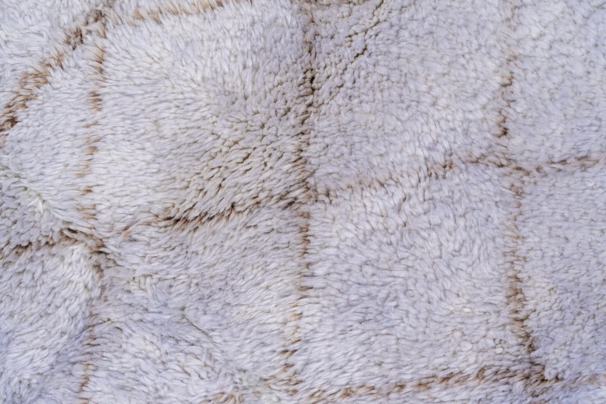 5' x 8' one-of-a-kind handmade vintage Moroccan medium size rug. Color palette: ivory, taupe, cream, beige, gray