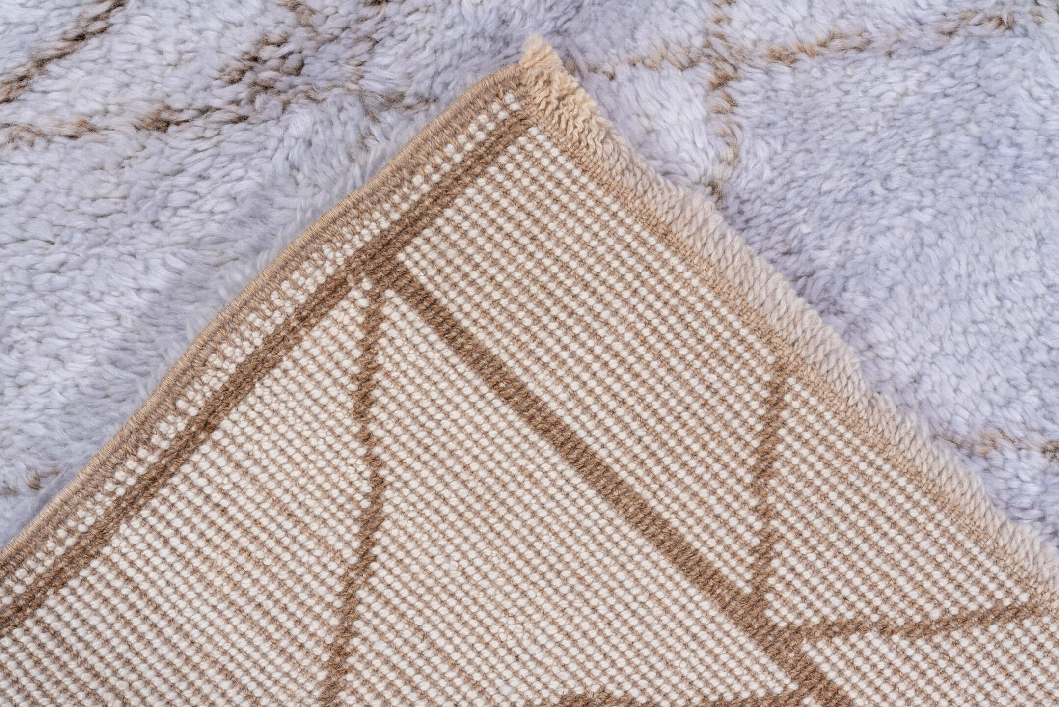 5' x 8' one-of-a-kind handmade vintage Moroccan medium size rug. Color palette: gray, lavender, light blue, light gray