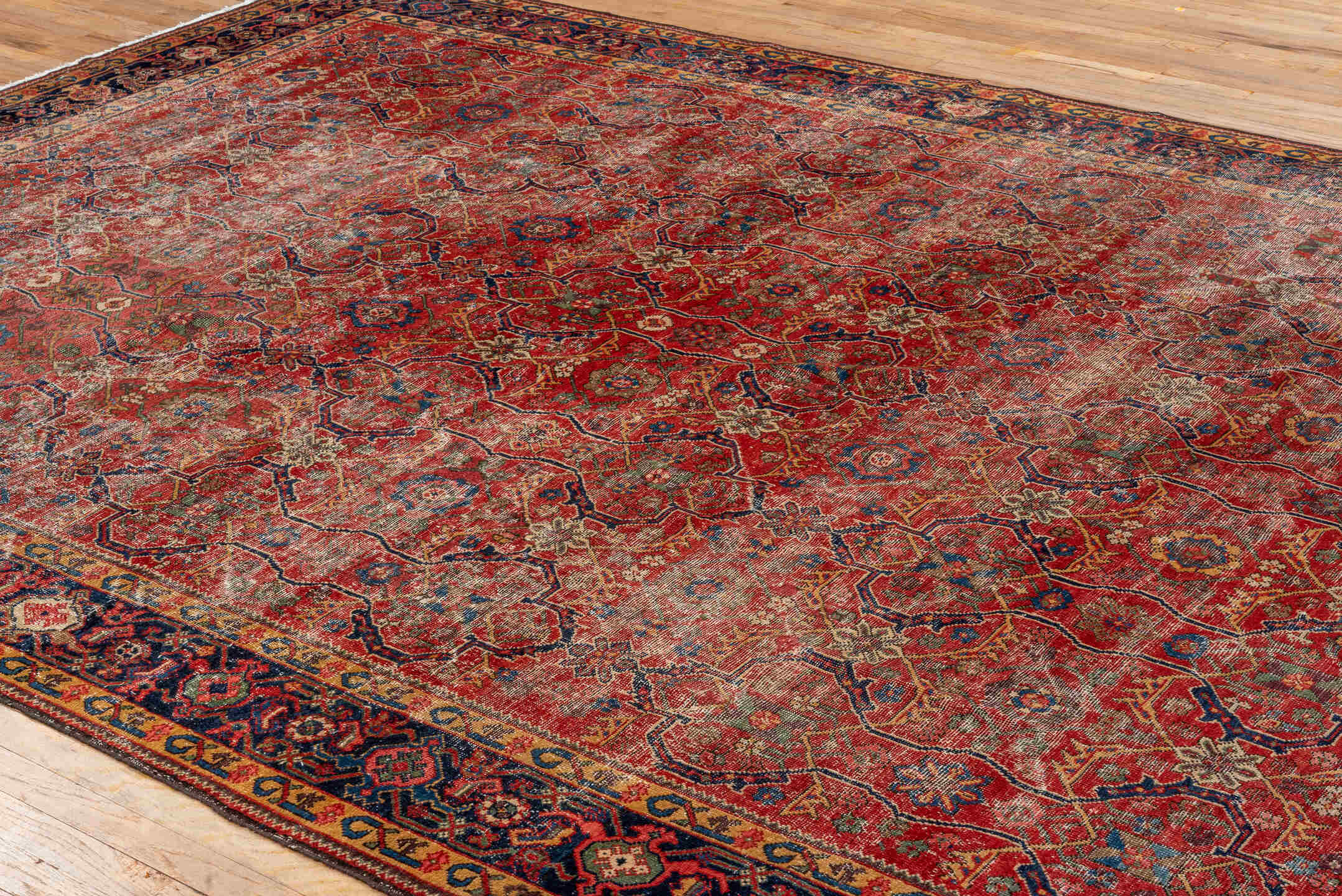 8' x 12' one-of-a-kind handmade vintage Mahal large size rug. Color palette: red, navy, ivory, rust, gold, slate, camel