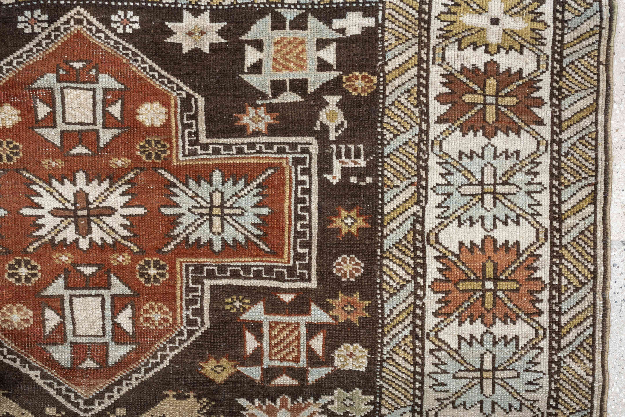 3' x 5' one-of-a-kind handmade antique Shirvan small size rug. Color palette: ivory, dark brown, rust, pale sage, sky blue