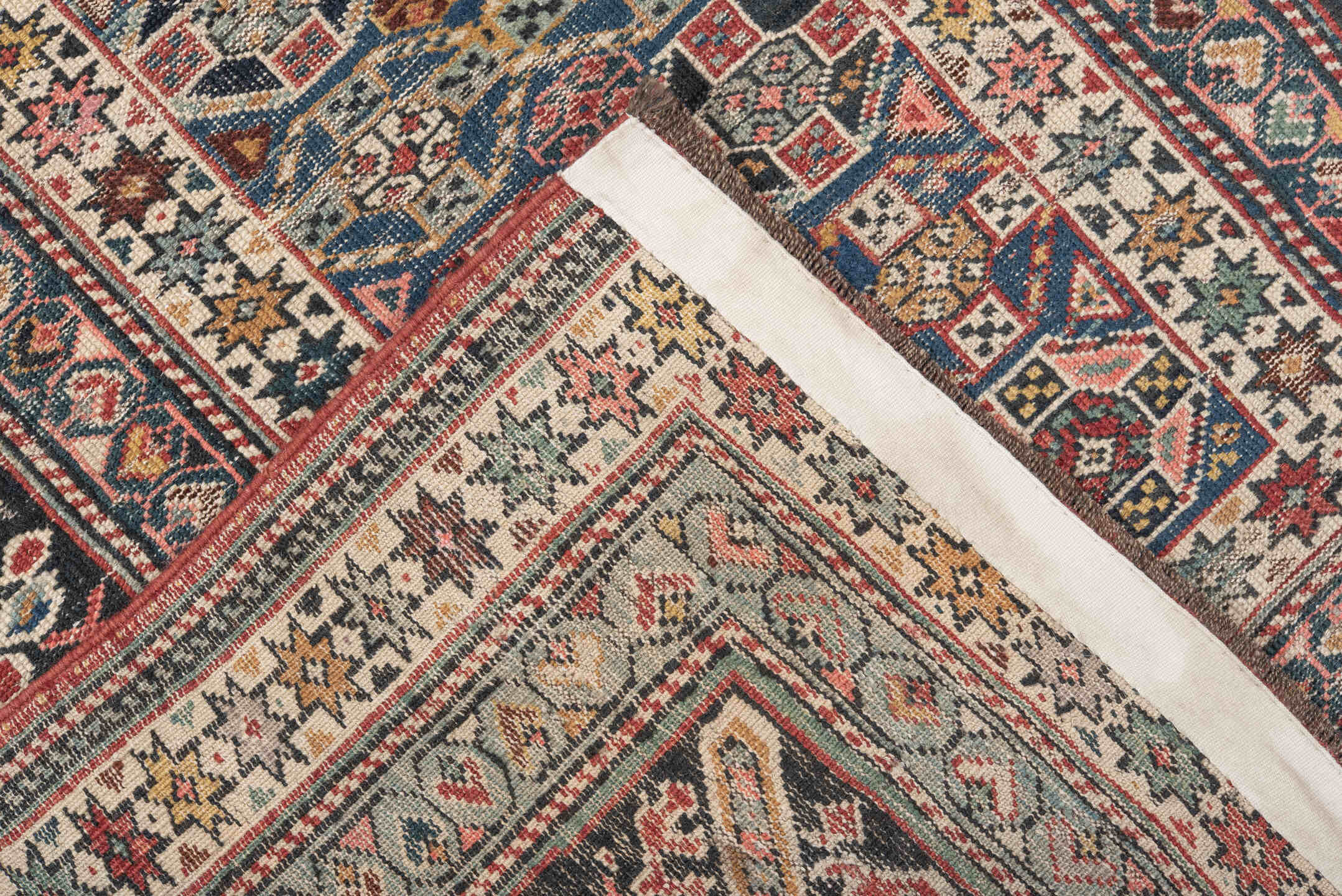 3' x 6' one-of-a-kind handmade antique Chichi small size rug. Color palette: ivory, indigo, rust, sky blue, navy, crimson
