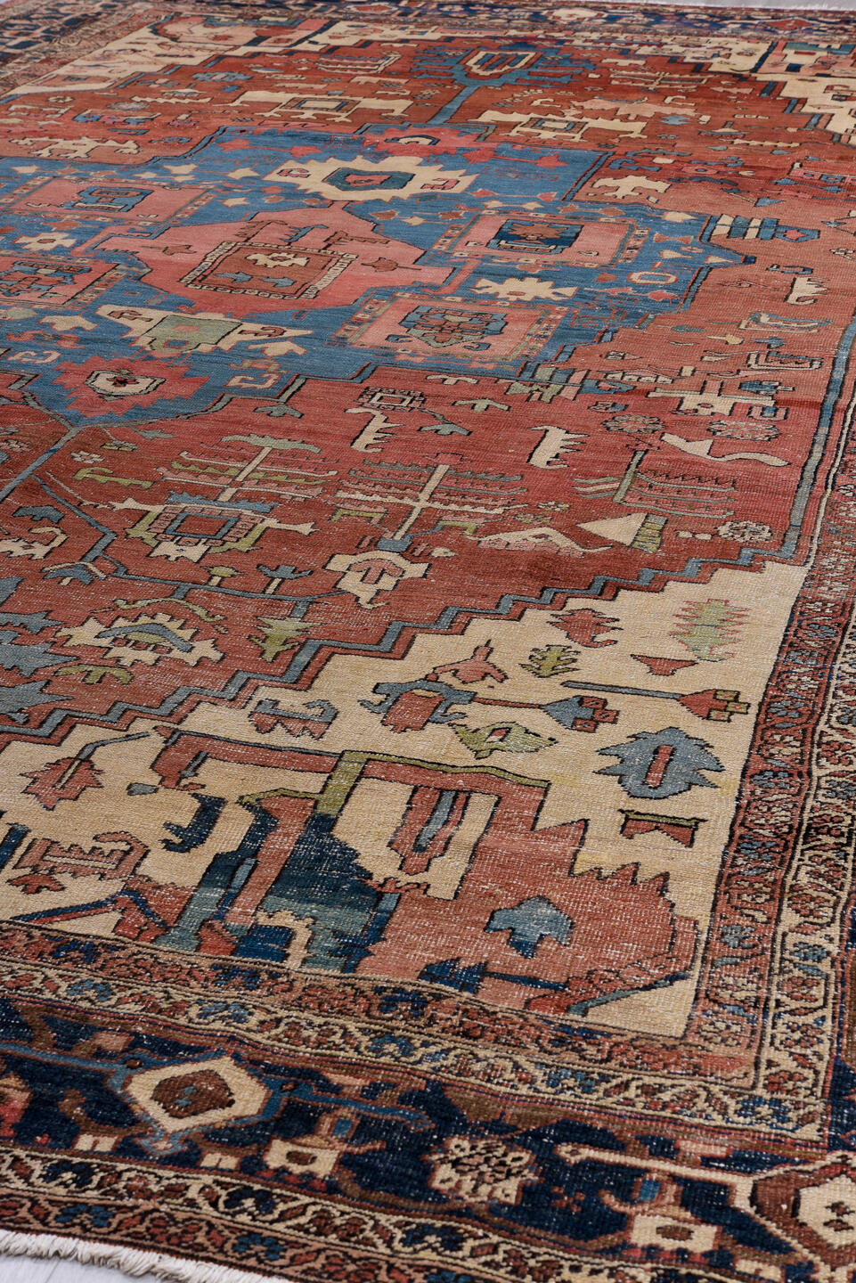 11' x 18' one-of-a-kind handmade vintage Serapi oversize rug. Color palette: arapawa, black, blue, brown, dark slate gray