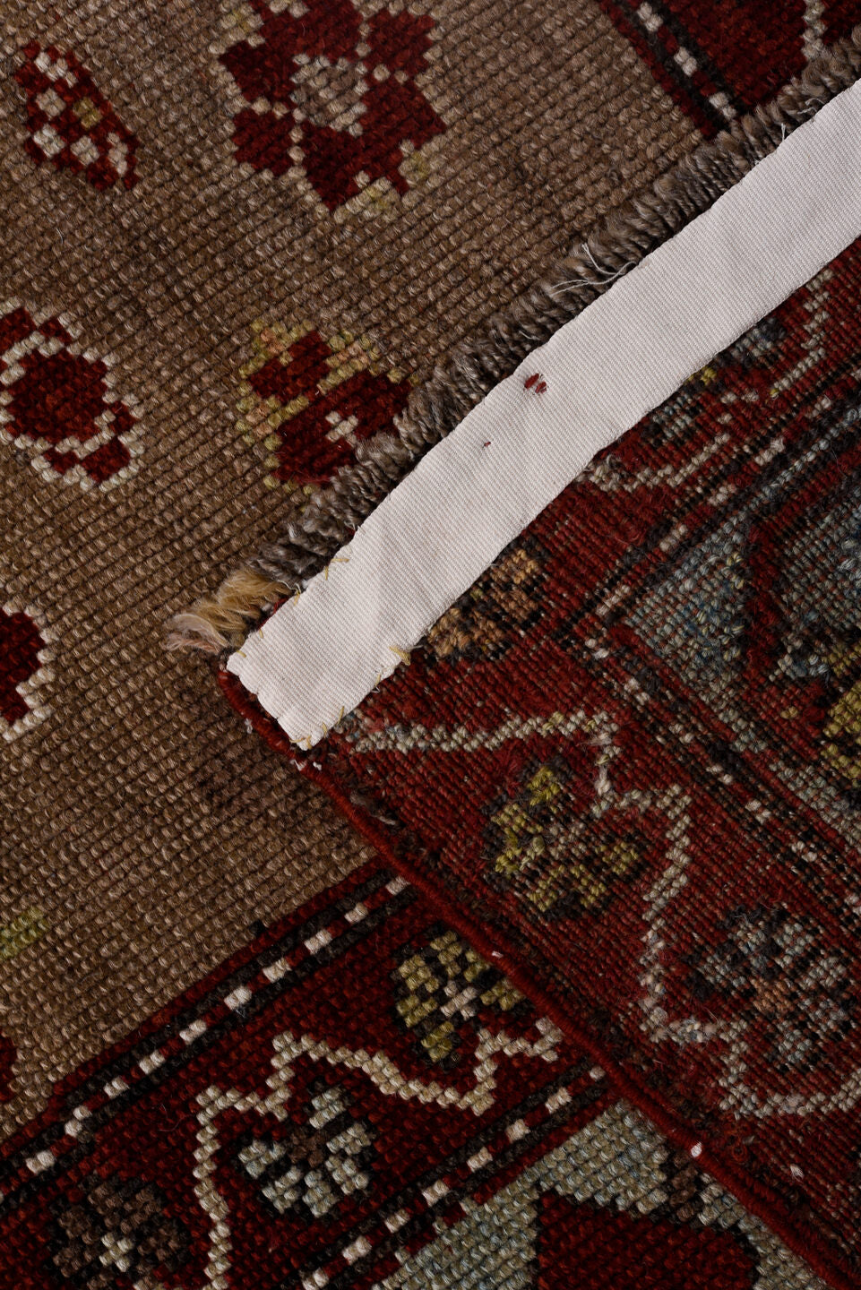 5' x 7' one-of-a-kind handmade vintage Kazak rug. Color palette: black, blue, brown, dim gray, gray, light gray, off-white