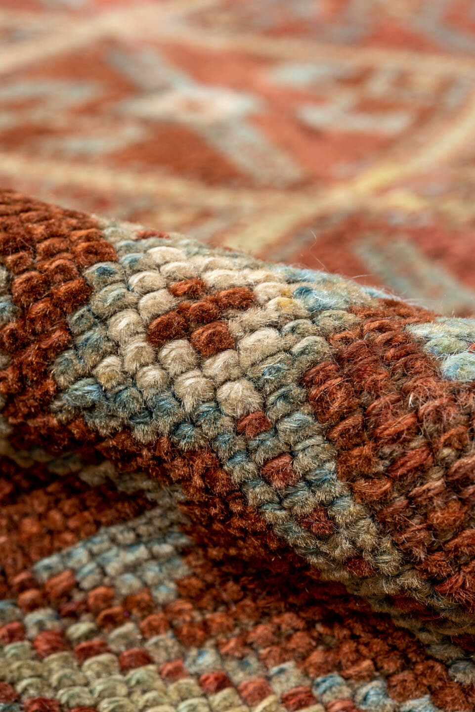 4' x 8' one-of-a-kind handmade antique Kurd rug. Color palette: rust, camel, ivory, sky blue, brown, taupe, gold, terracotta