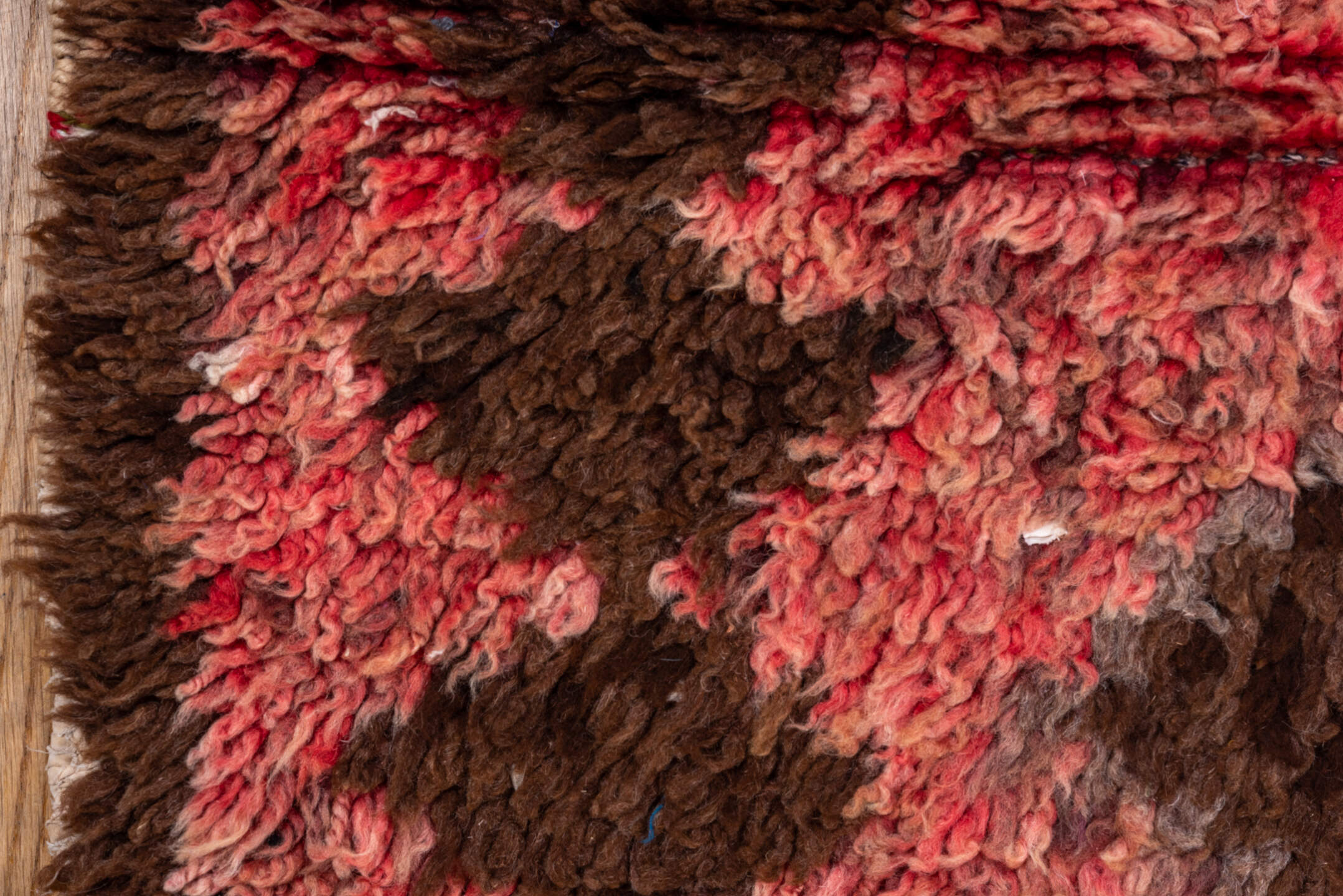 2' x 8' one-of-a-kind handmade vintage Moroccan runner rug. Color palette: pink, brown, red, black