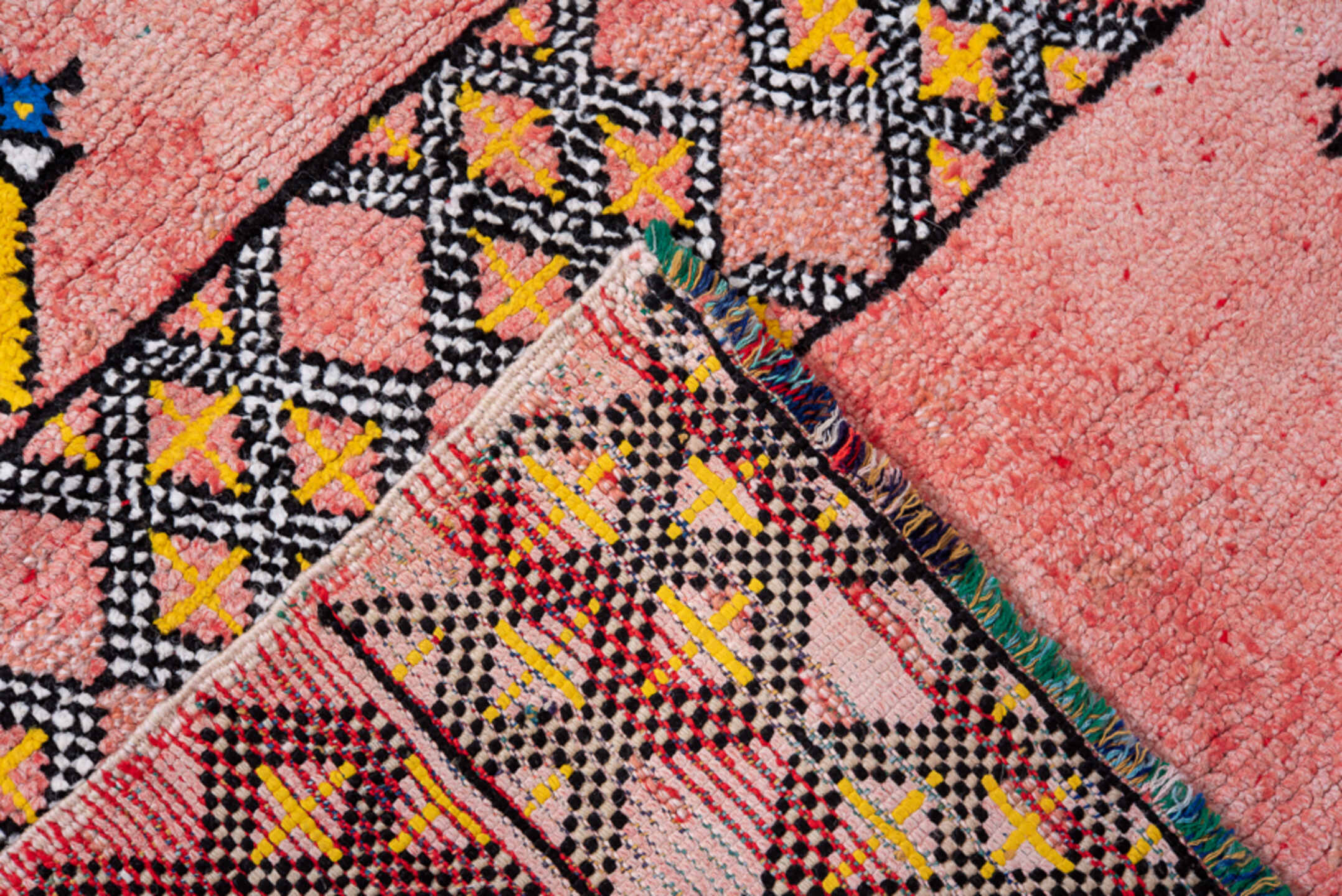 4' x 6' one-of-a-kind handmade vintage Moroccan small size rug. Color palette: pink, yellow, charcoal, taupe, blue, ivory