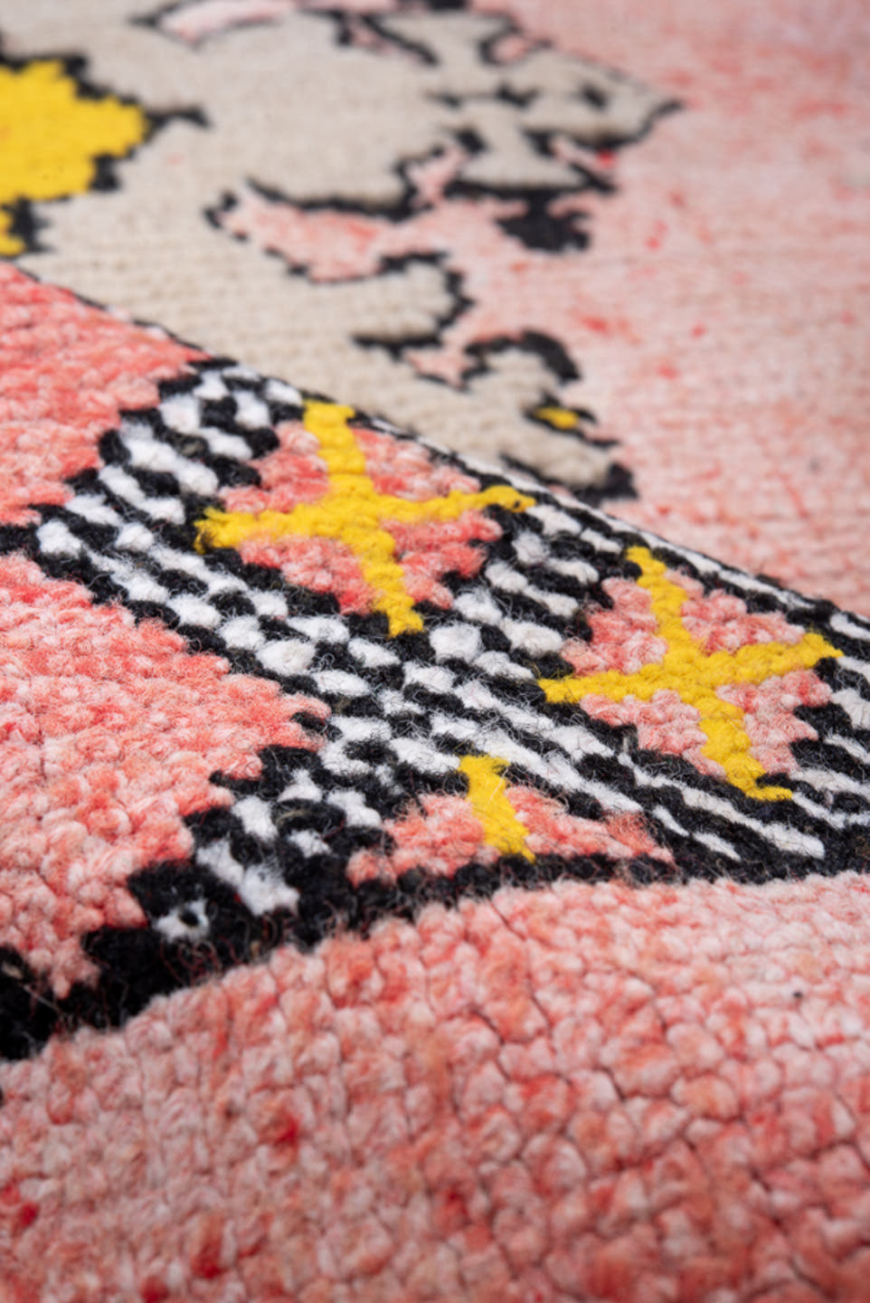 4' x 6' one-of-a-kind handmade vintage Moroccan small size rug. Color palette: pink, yellow, charcoal, taupe, blue, ivory