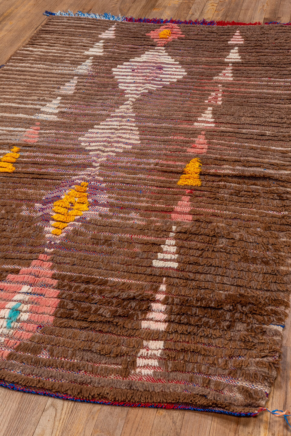 3' x 7' one-of-a-kind handmade vintage Moroccan rug. Color palette: brown, taupe, ivory, blush, saffron, rose, sky_blue