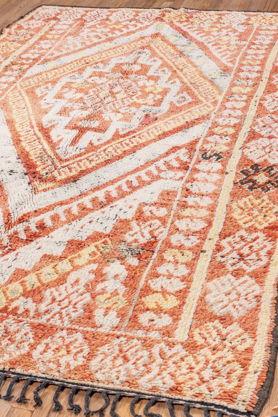 5' x 9' one-of-a-kind handmade vintage Moroccan medium size rug. Color palette: terra cotta, ivory, rust, gold, charcoal