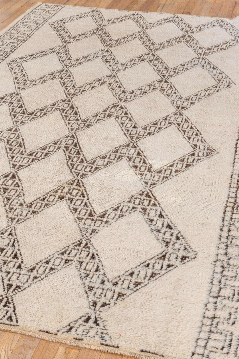 5' x 8' one-of-a-kind handmade vintage Moroccan medium size rug. Color palette: ivory, brown, taupe, beige, gray