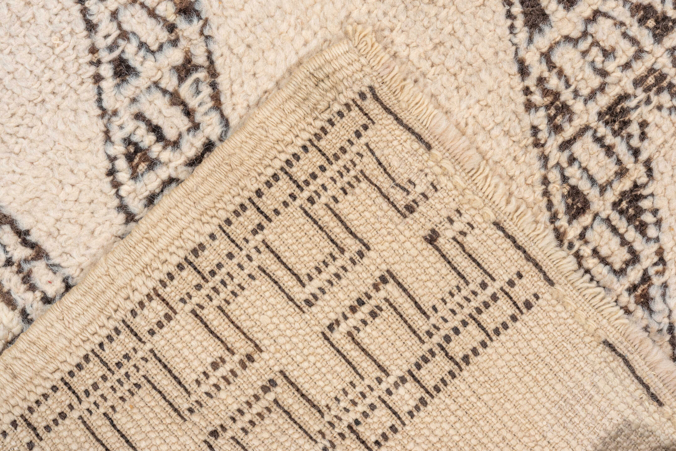 5' x 8' one-of-a-kind handmade vintage Moroccan medium size rug. Color palette: brown, gray, pink, off-white, light gray