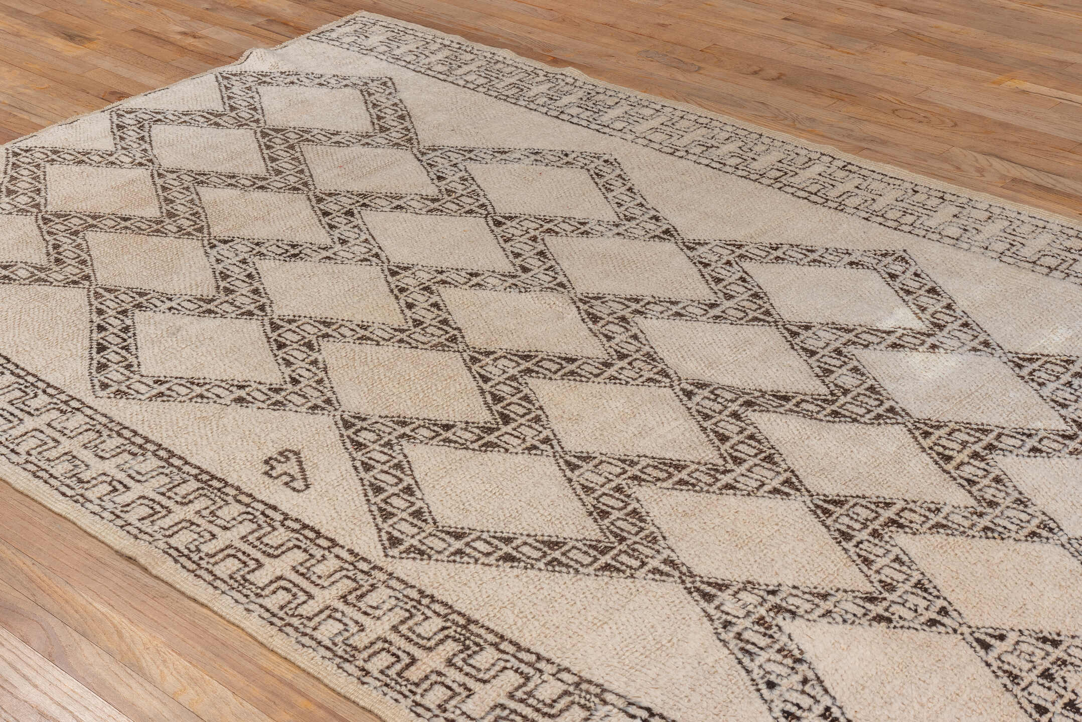5' x 8' one-of-a-kind handmade vintage Moroccan medium size rug. Color palette: ivory, brown, taupe, beige, gray