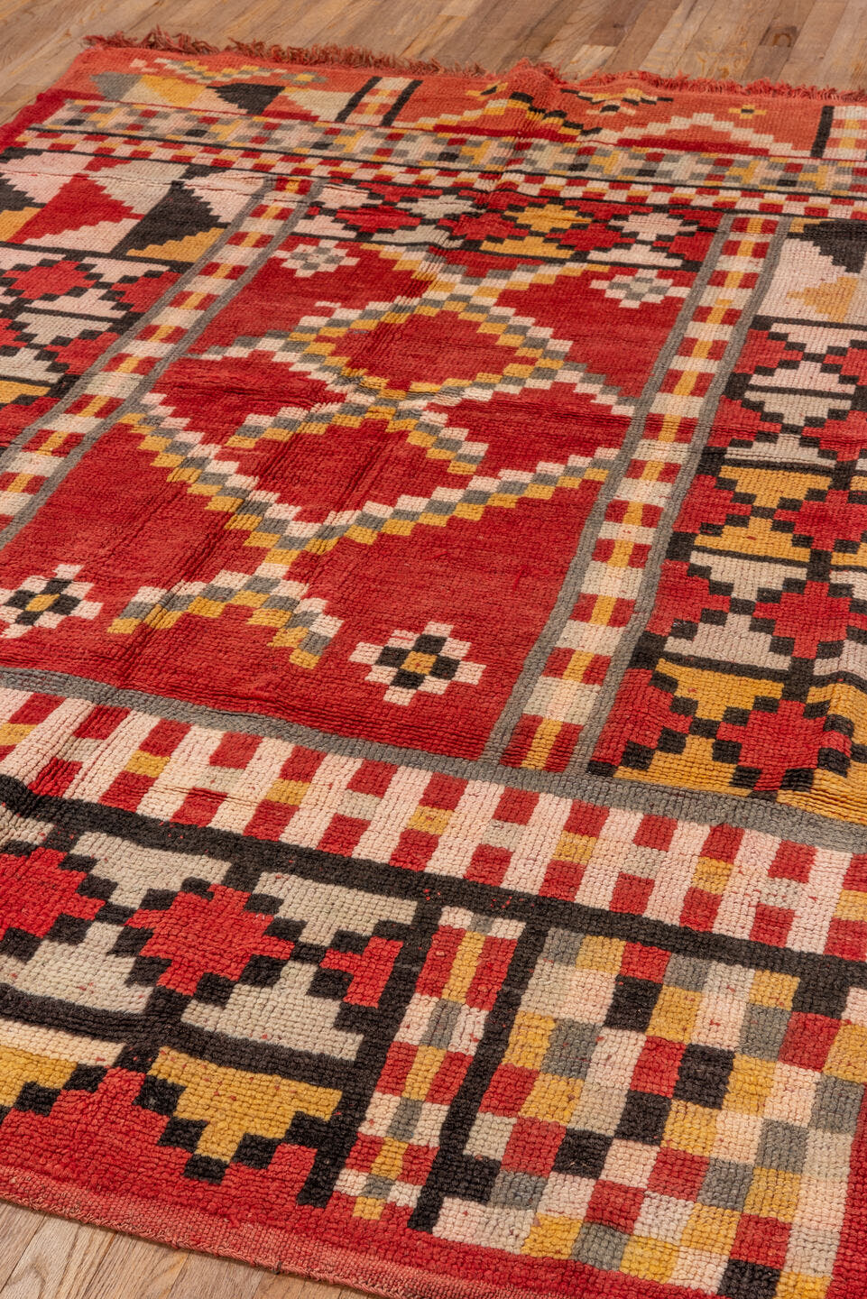 5' x 8' one-of-a-kind handmade vintage Moroccan medium size rug. Color palette: terra cotta, ivory, charcoal, gold, gray