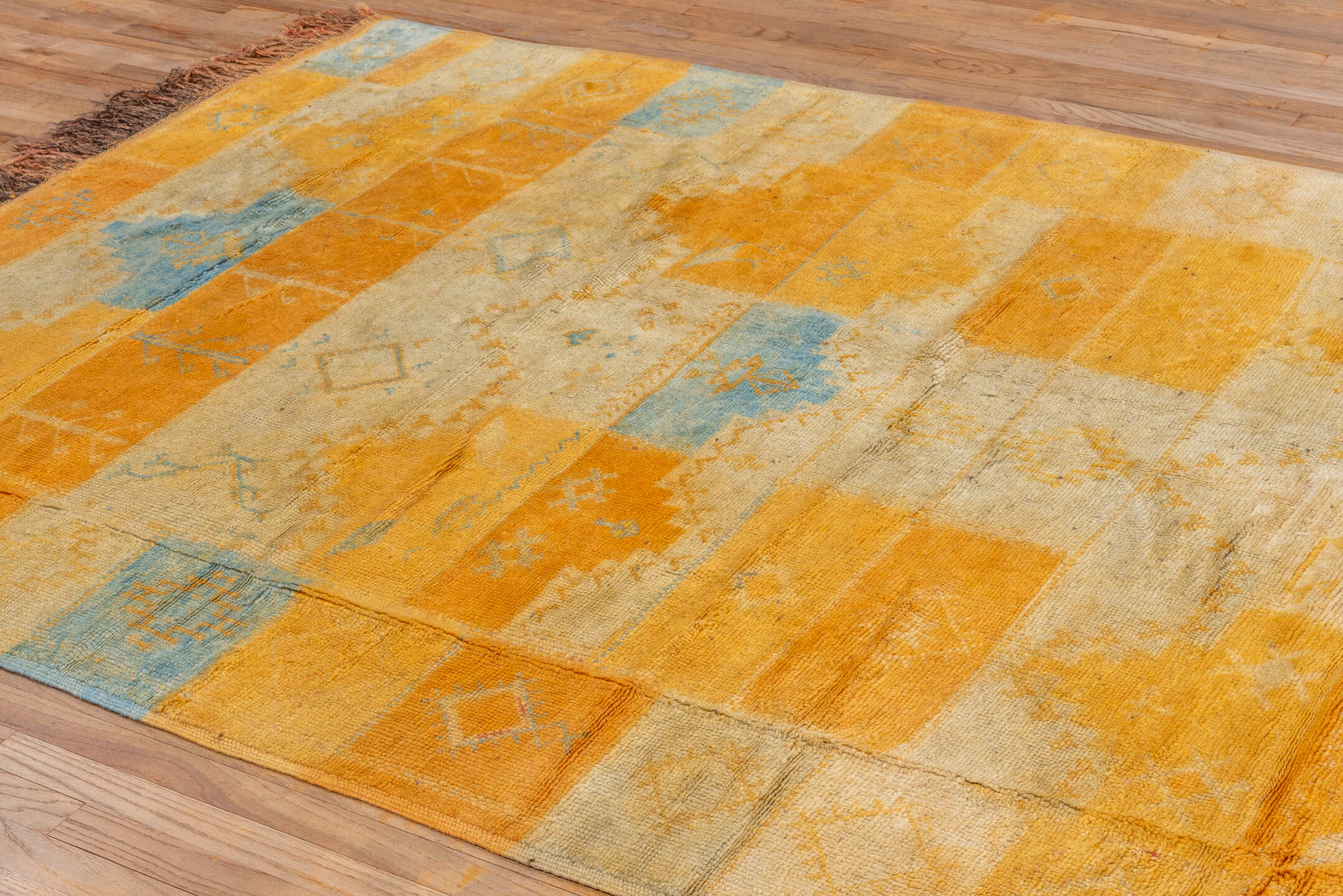 6' x 10' one-of-a-kind handmade vintage Moroccan large size rug. Color palette: saffron, ivory, gold, sky_blue, camel, taupe