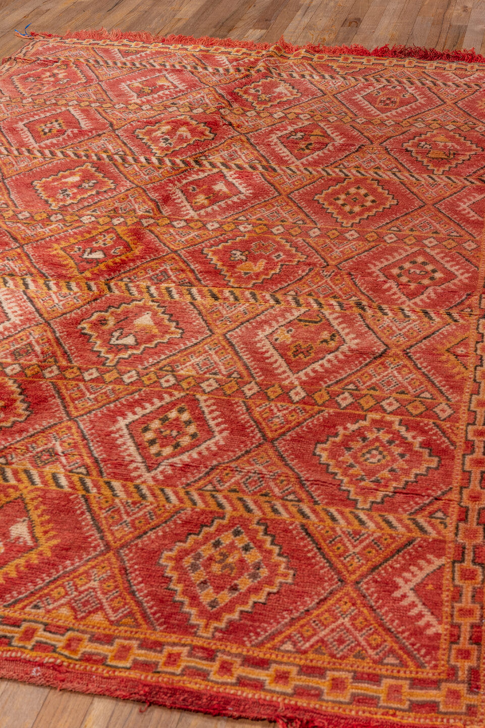 5' x 8' one-of-a-kind handmade vintage Moroccan medium size rug. Color palette: terra cotta, coral, rust, saffron, ivory