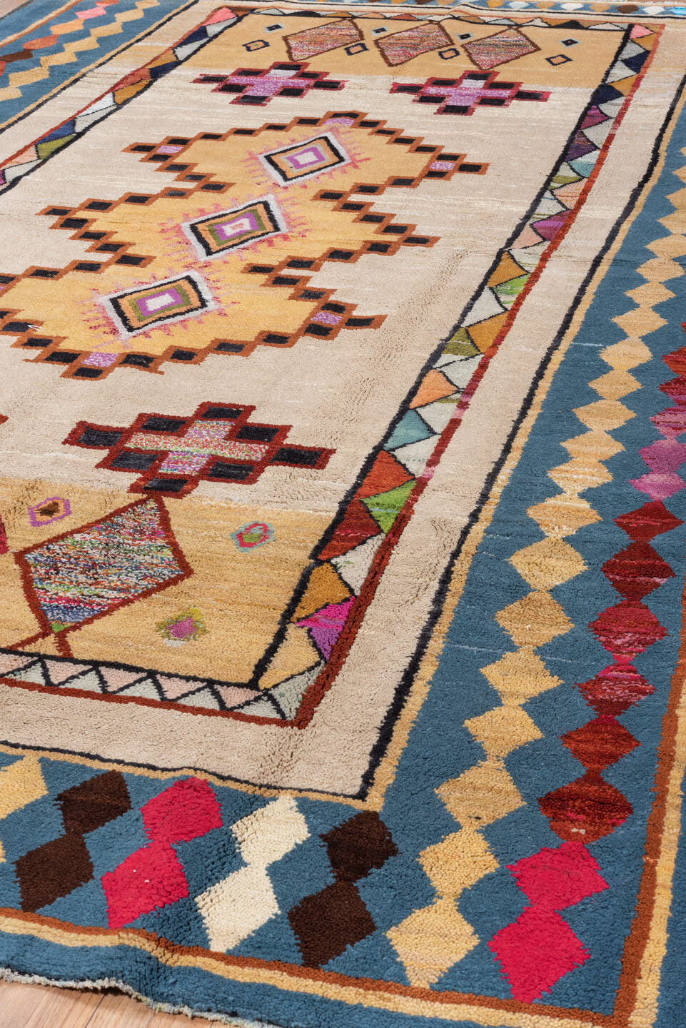7' x 12' one-of-a-kind handmade vintage Moroccan large size rug. Color palette: ivory, blue, camel, crimson, pink, black