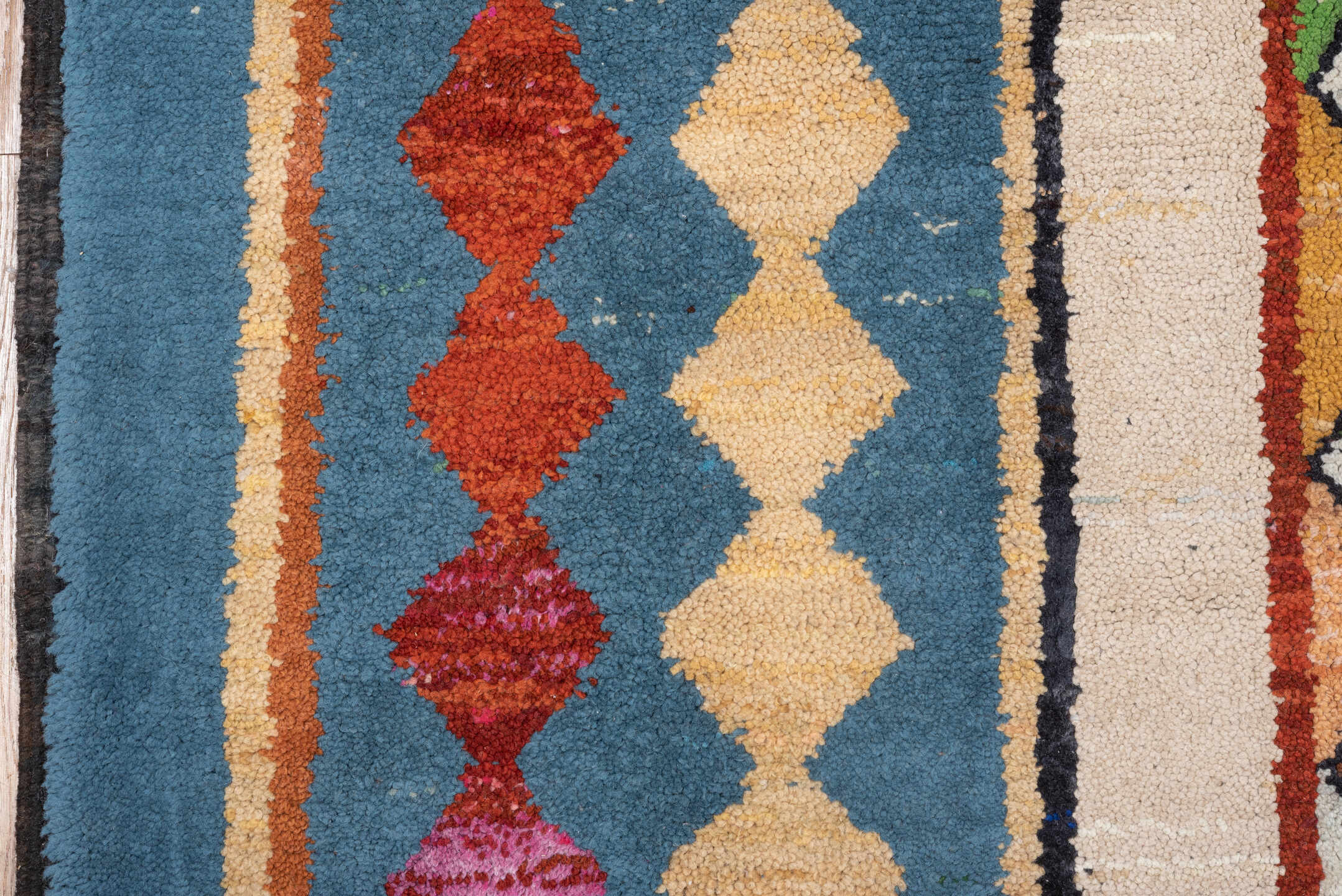 7' x 12' one-of-a-kind handmade vintage Moroccan large size rug. Color palette: ivory, blue, camel, crimson, pink, black