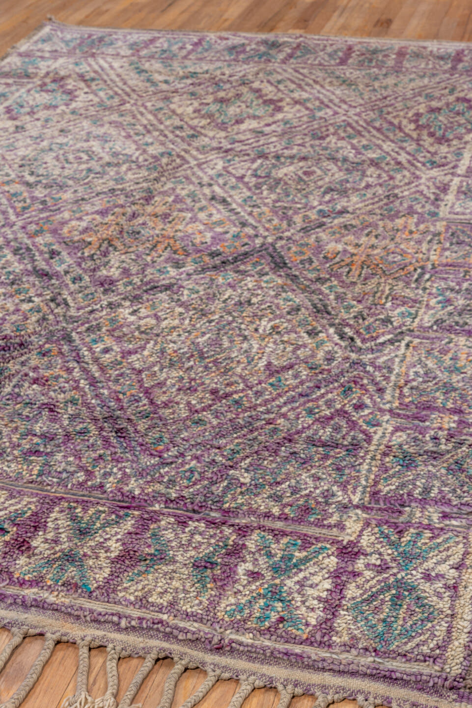 6' x 9' one-of-a-kind handmade vintage Moroccan medium size rug. Color palette: lavender, ivory, taupe, turquoise, rose