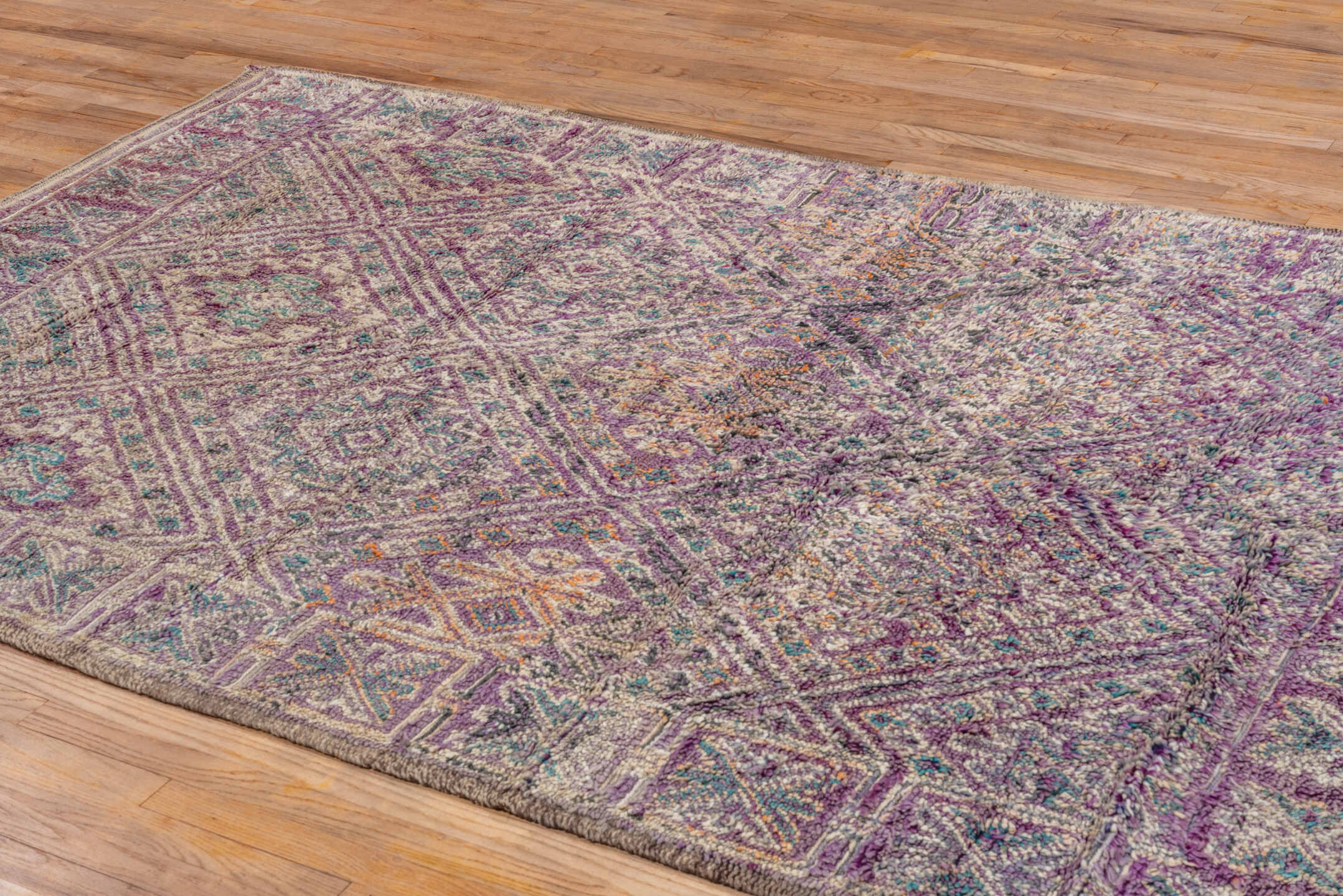 6' x 9' one-of-a-kind handmade vintage Moroccan medium size rug. Color palette: lavender, ivory, taupe, turquoise, rose