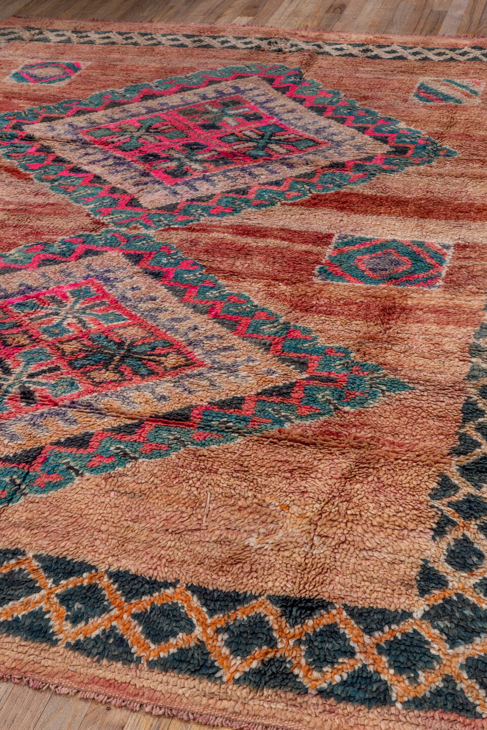 6' x 9' one-of-a-kind handmade antique Moroccan medium size rug. Color palette: rose, peach, charcoal, teal, lavender