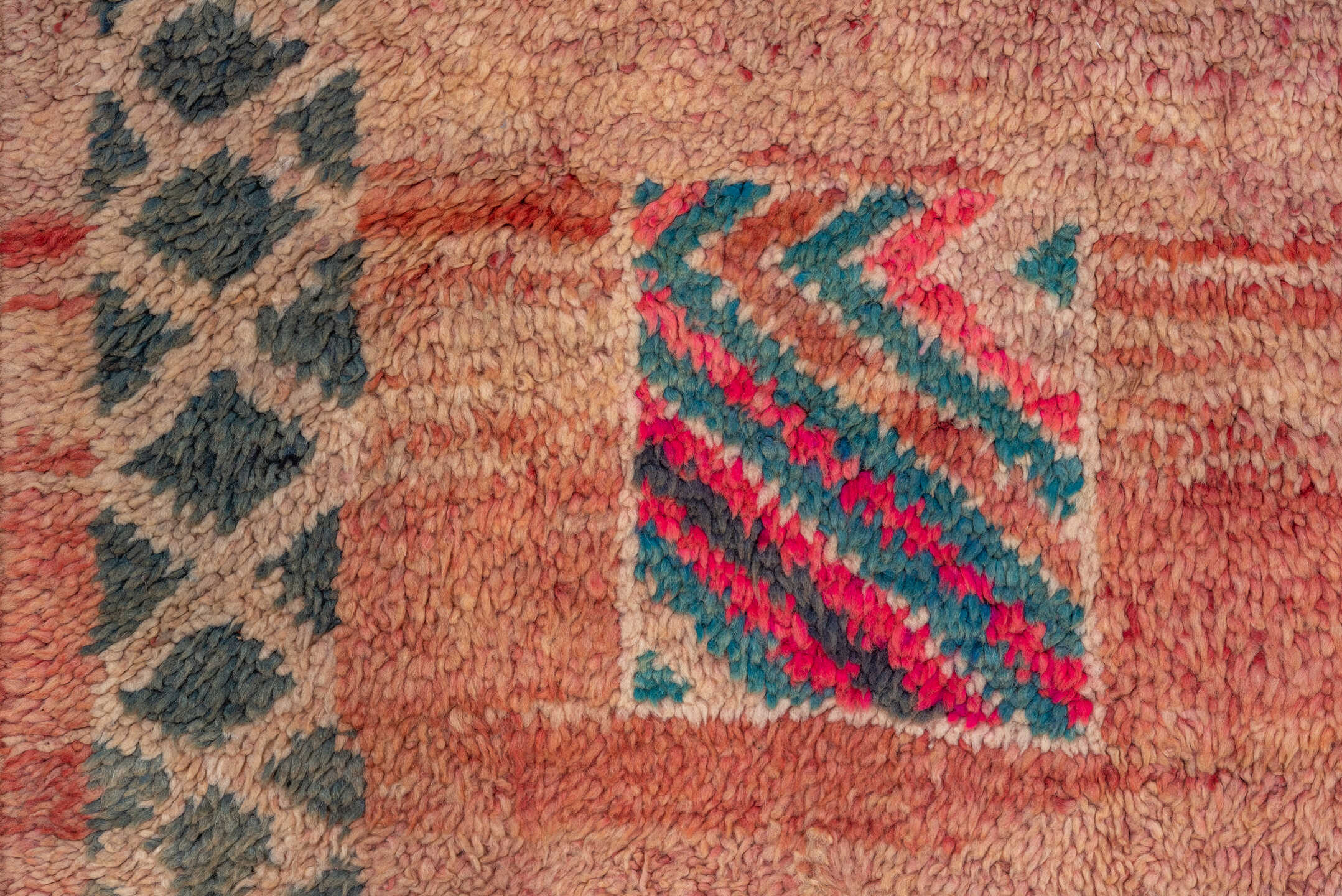 6' x 9' one-of-a-kind handmade antique Moroccan medium size rug. Color palette: rose, peach, charcoal, teal, lavender