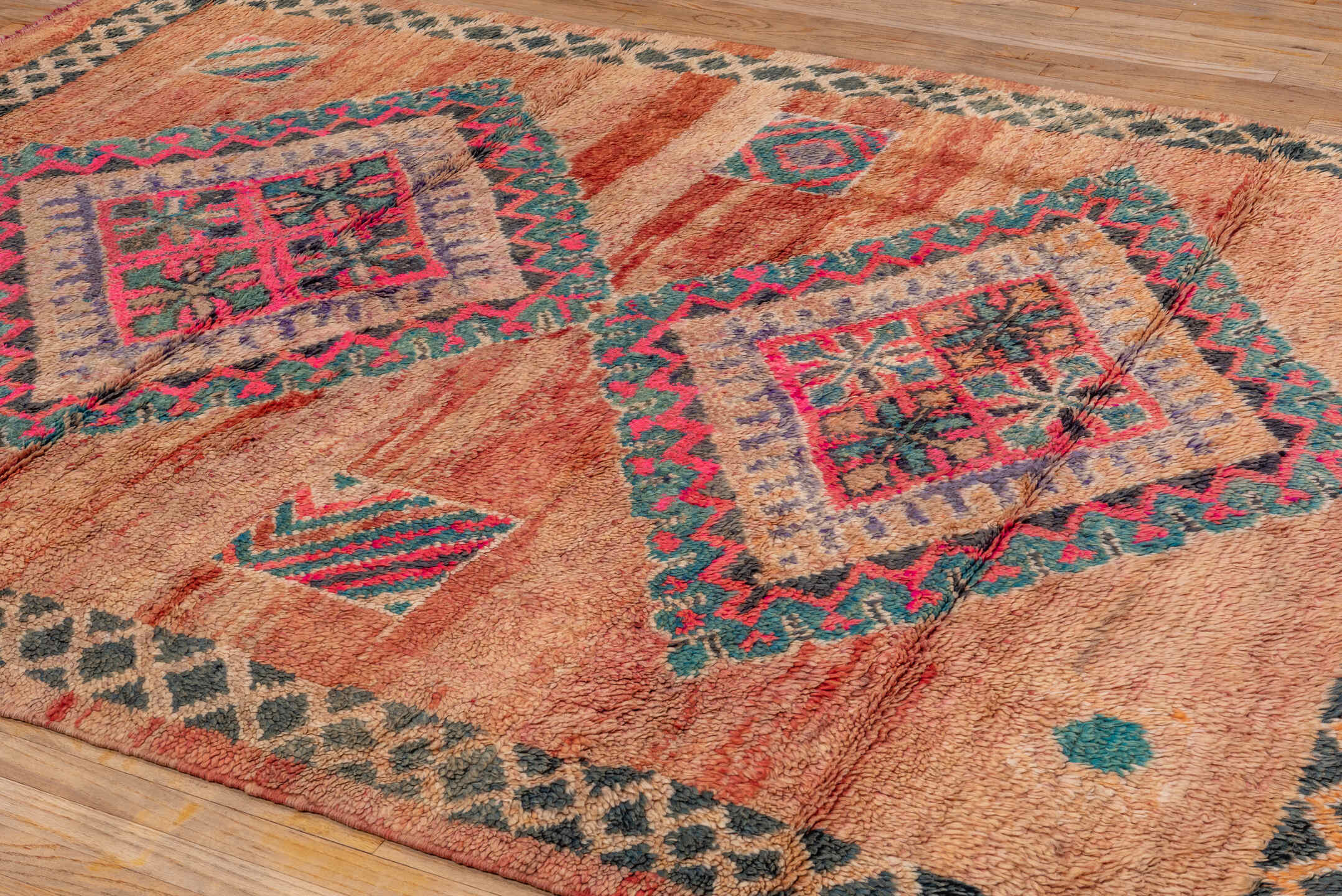 6' x 9' one-of-a-kind handmade antique Moroccan medium size rug. Color palette: rose, peach, charcoal, teal, lavender