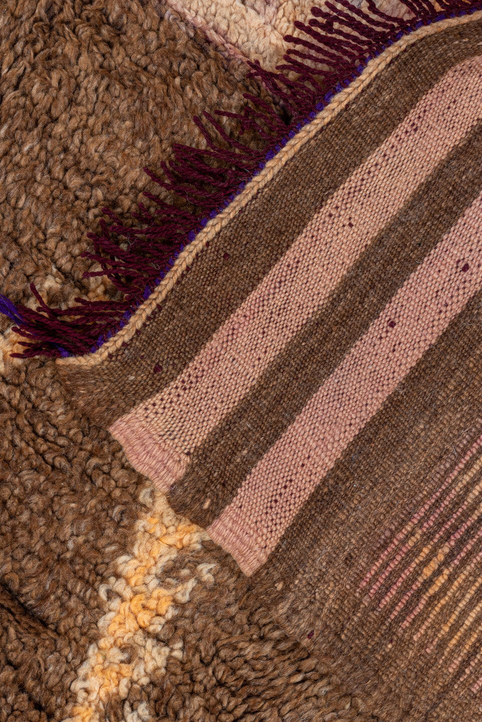 4' x 7' one-of-a-kind handmade vintage Moroccan rug. Color palette: brown, ivory, blush, taupe, charcoal, teal, purple, gold