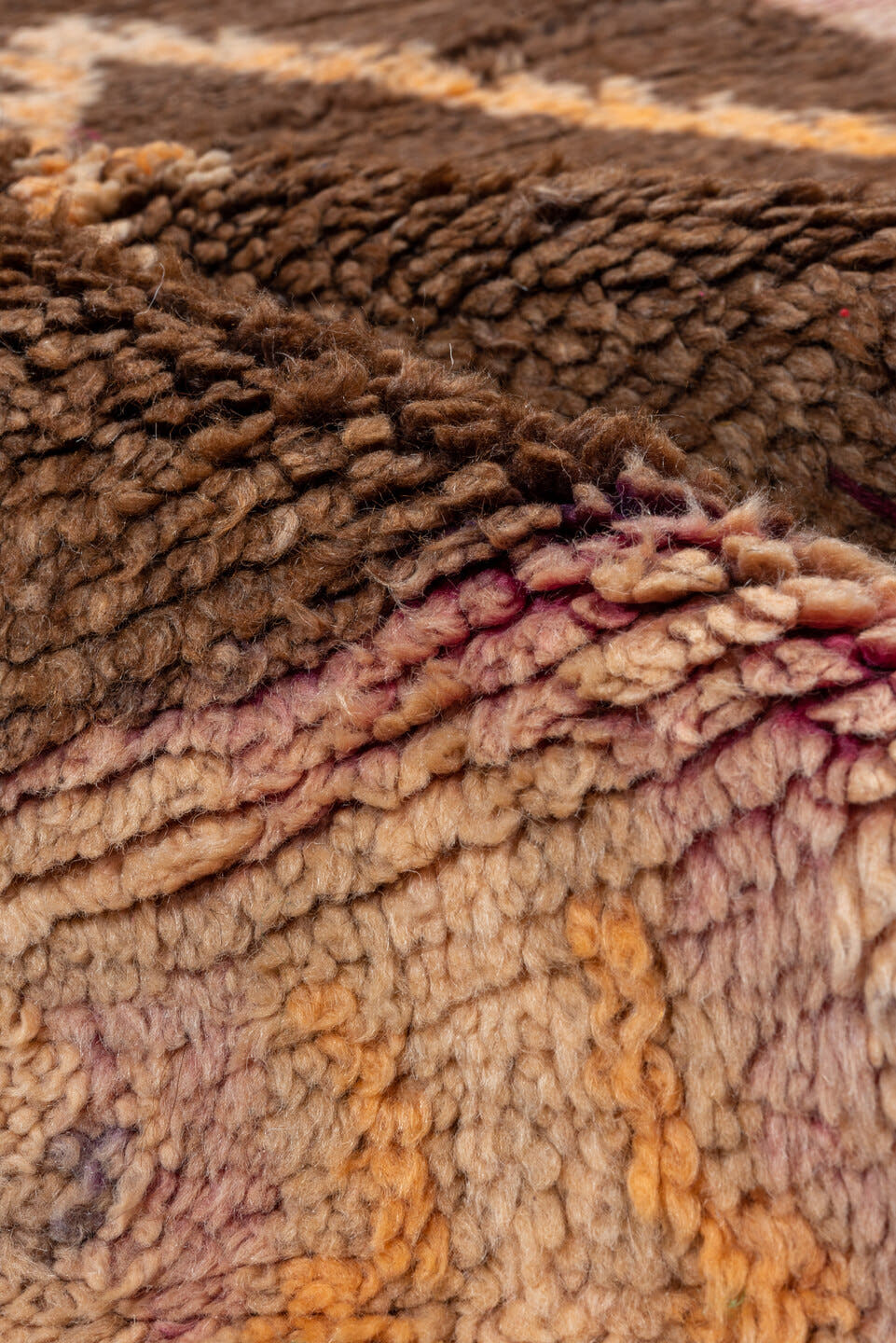 4' x 7' one-of-a-kind handmade vintage Moroccan rug. Color palette: brown, ivory, blush, taupe, charcoal, teal, purple, gold