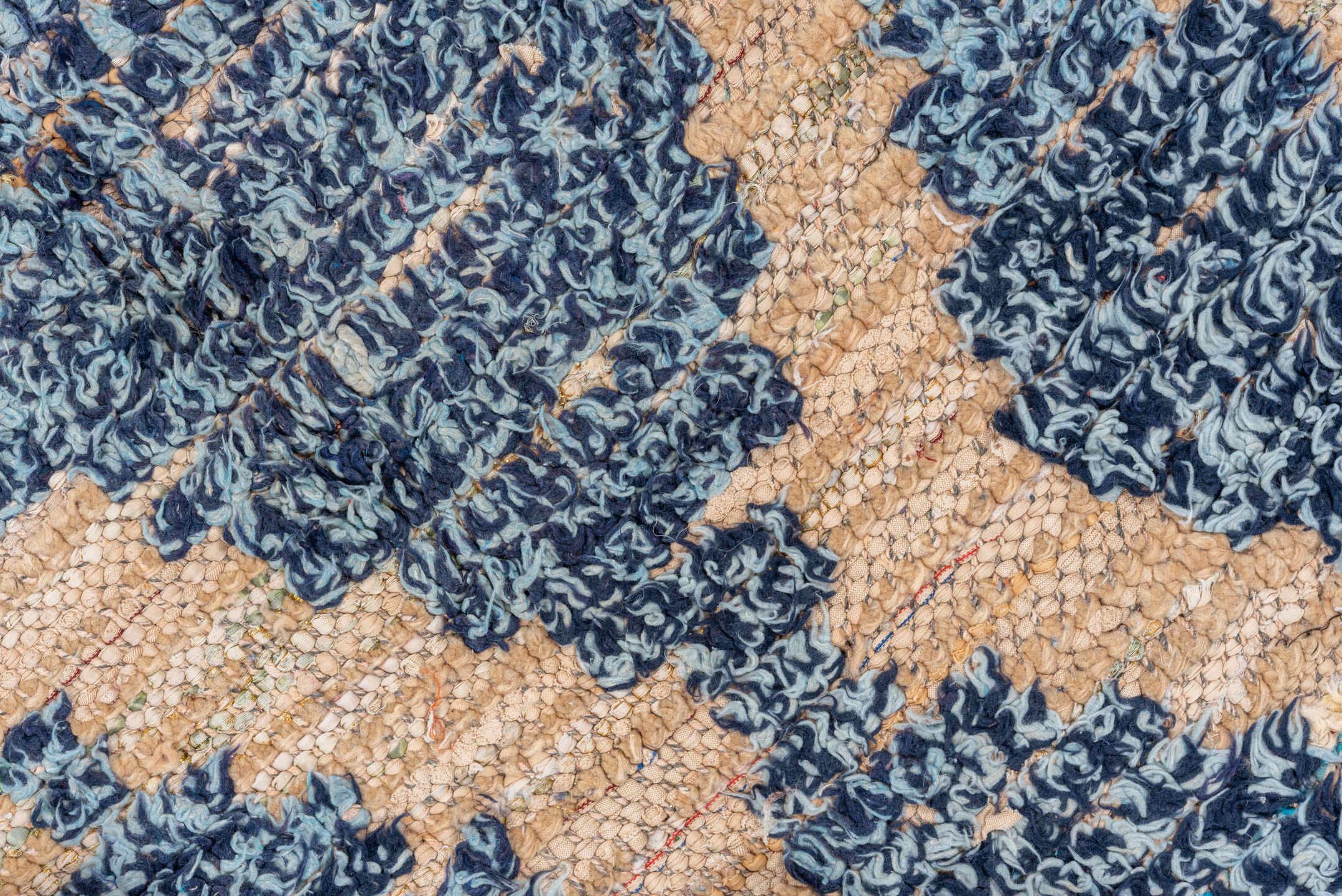 4' x 7' one-of-a-kind handmade vintage Moroccan rug. Color palette: indigo, ivory, navy, charcoal, rose, purple, blue, gray