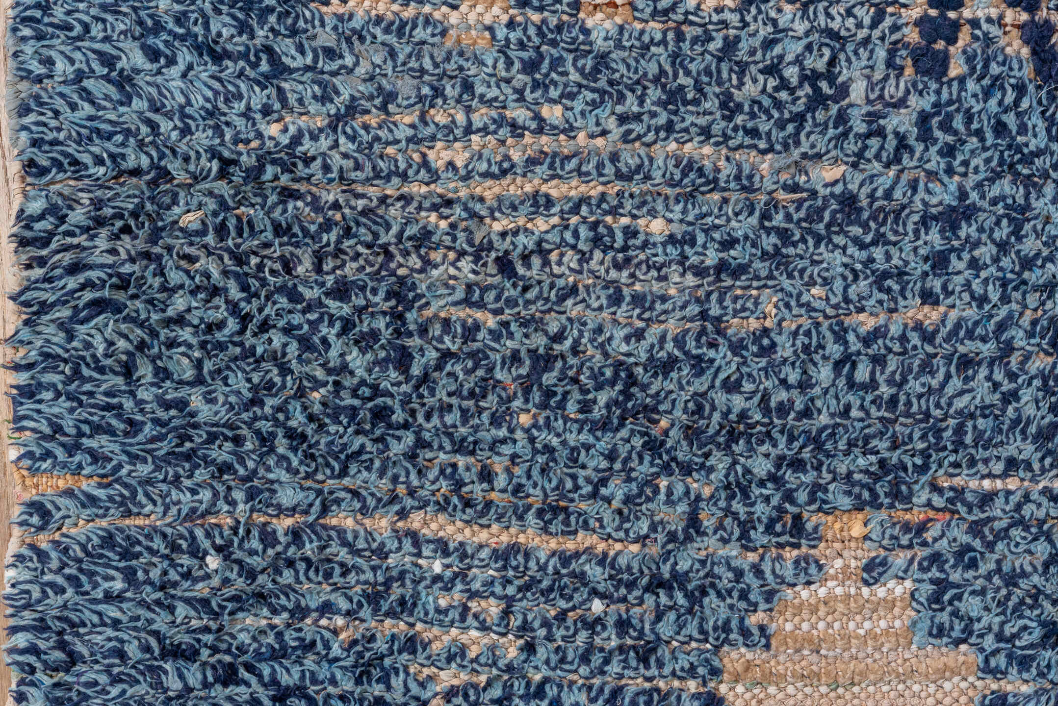 4' x 7' one-of-a-kind handmade vintage Moroccan rug. Color palette: indigo, ivory, navy, charcoal, rose, purple, blue, gray