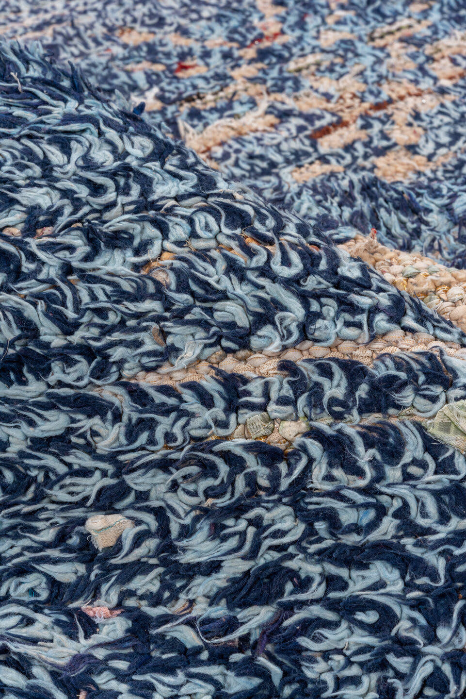 4' x 7' one-of-a-kind handmade vintage Moroccan rug. Color palette: indigo, ivory, navy, charcoal, rose, purple, blue, gray