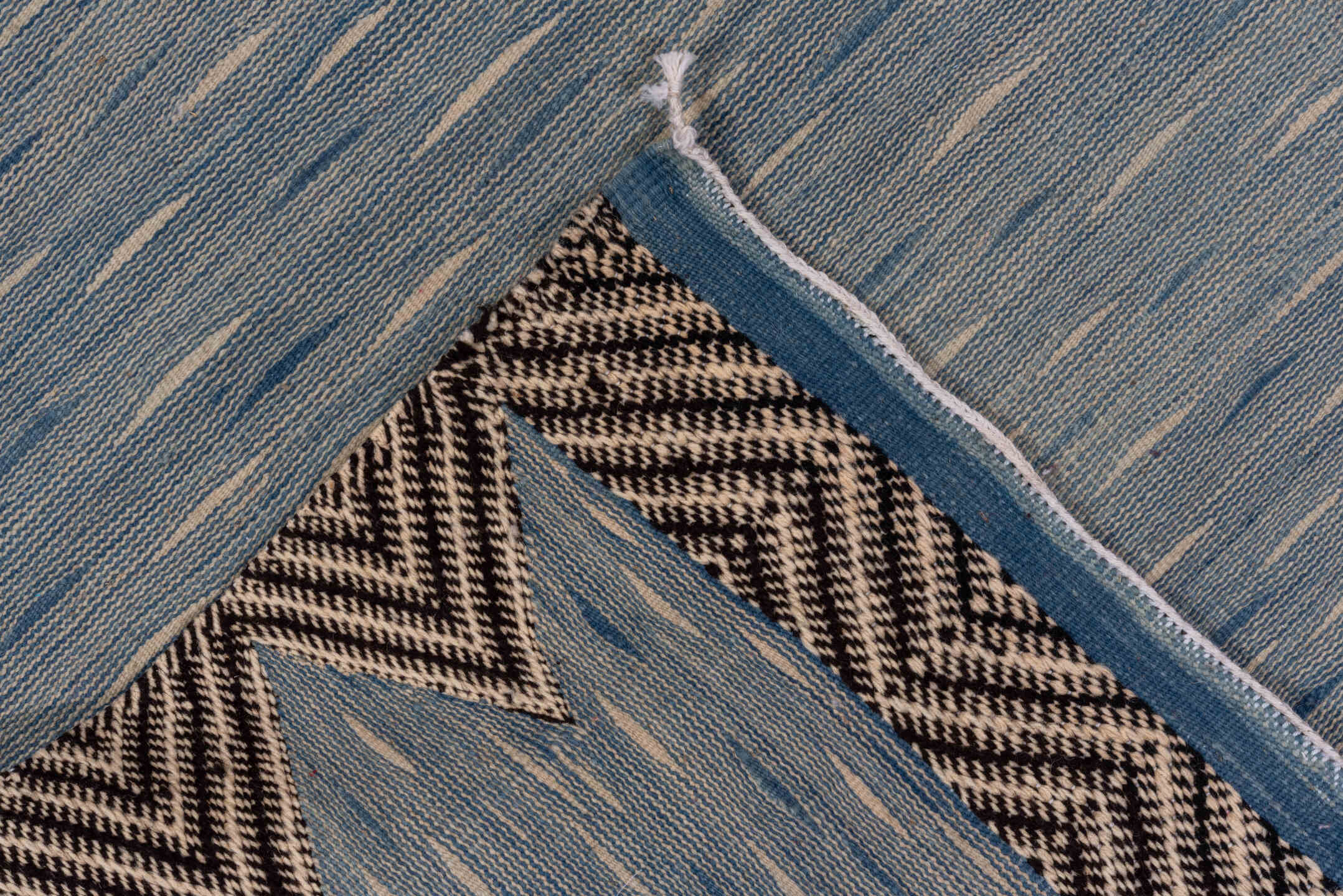 4' x 8' one-of-a-kind handmade vintage Kilim rug. Color palette: pale blue, ivory, charcoal, slate, light blue, gray, black