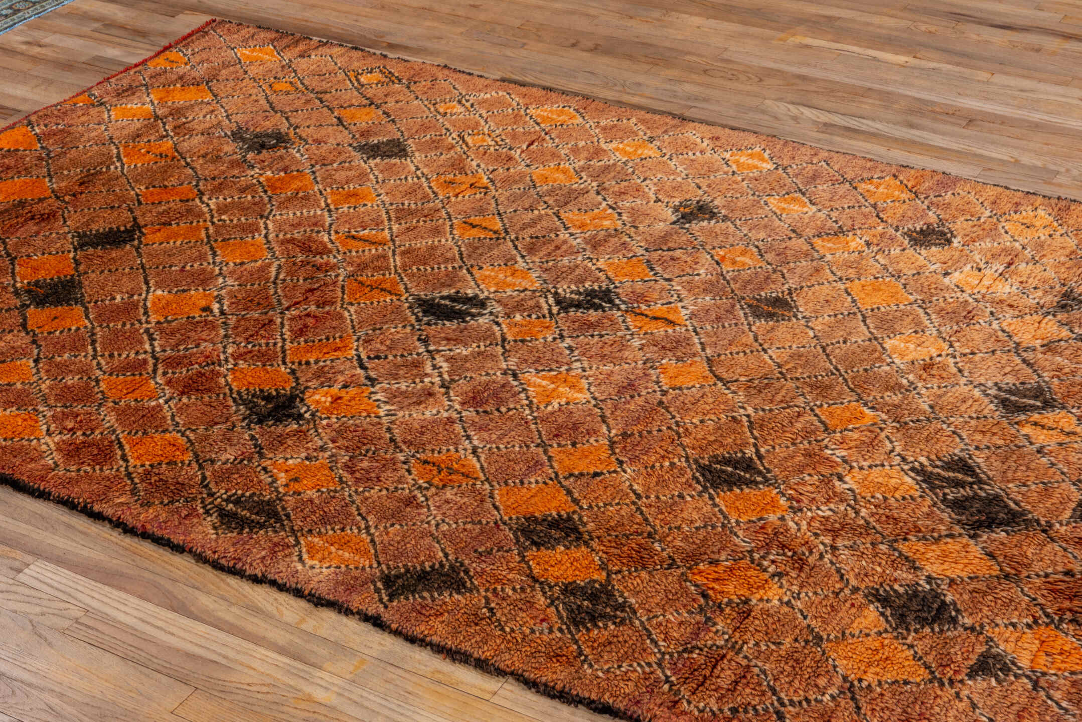 6' x 10' one-of-a-kind handmade antique Moroccan large size rug. Color palette: terra cotta, orange, brown, camel, charcoal