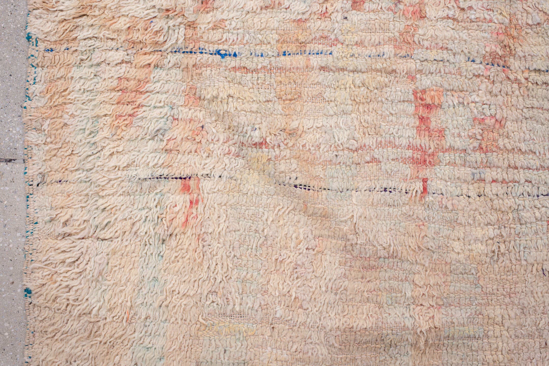 5' x 7' one-of-a-kind handmade antique Moroccan rug. Color palette: ivory, blush, peach, pale blue, cream, charcoal, pink