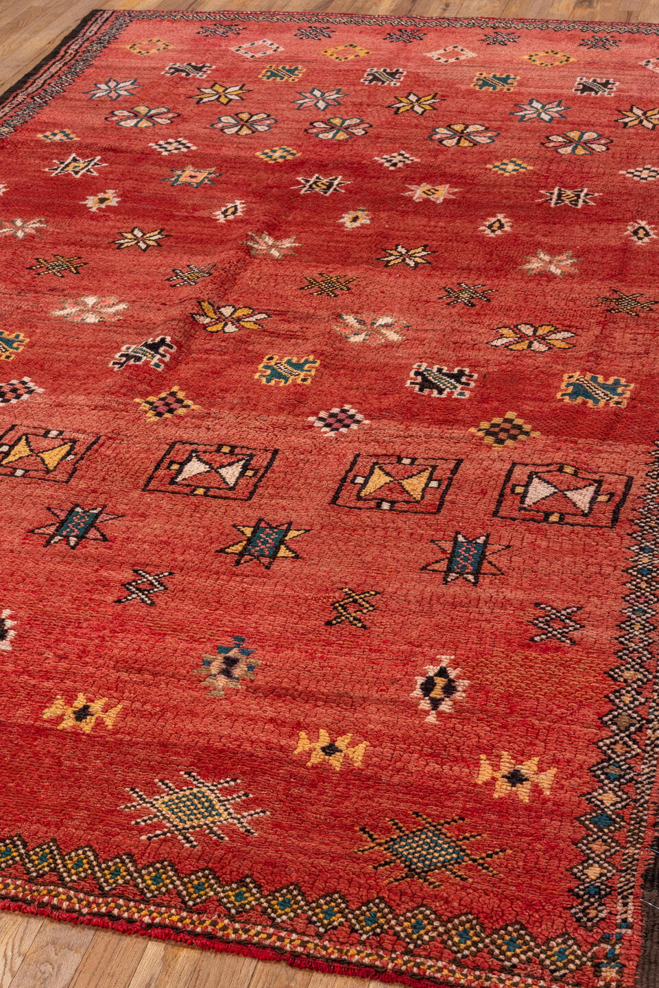 5' x 10' one-of-a-kind handmade antique Moroccan medium size rug. Color palette: terra cotta, rust, charcoal, ivory, gold