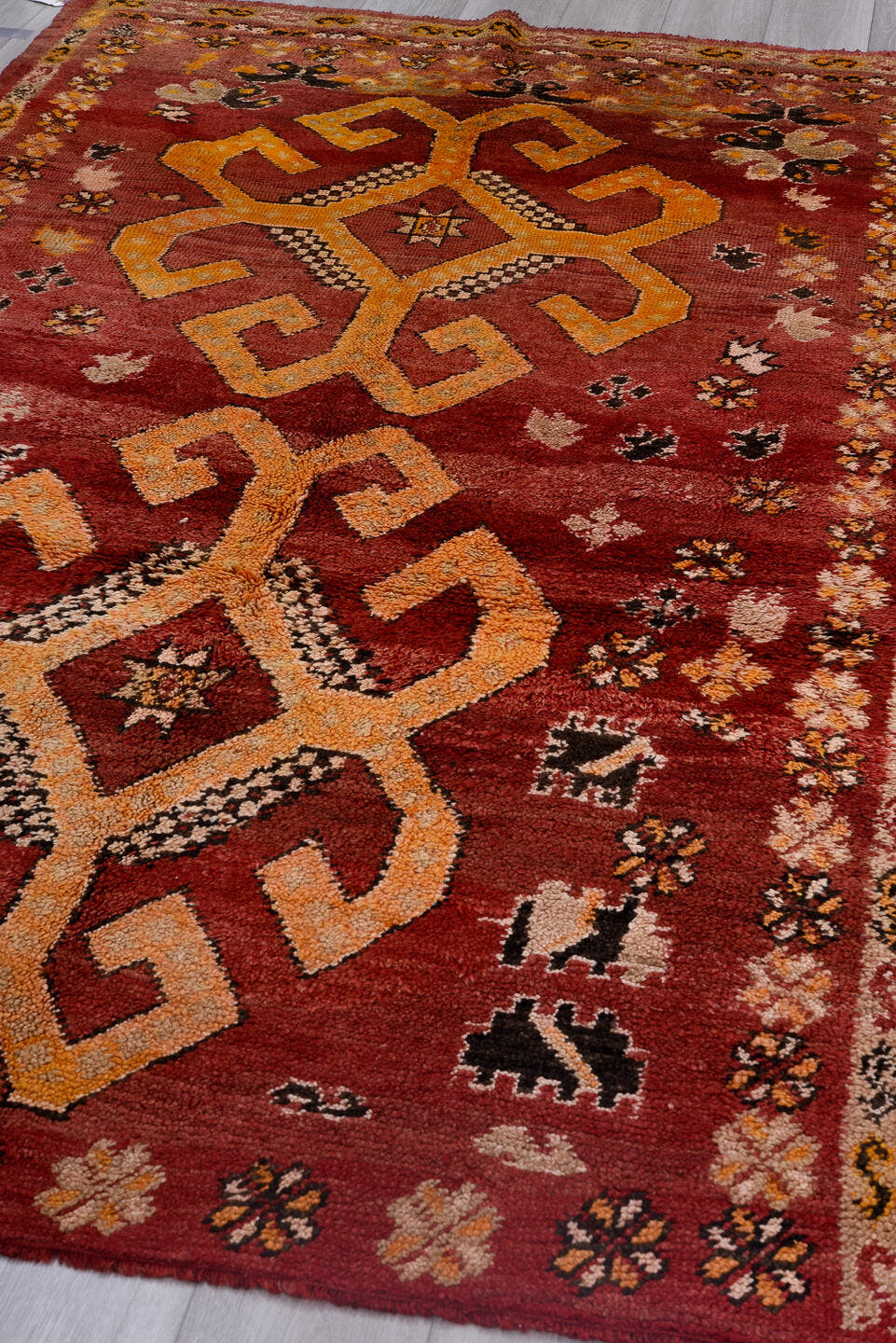 5' x 9' one-of-a-kind handmade antique Moroccan medium size rug. Color palette: red, gold, ivory, black, rose, rust, camel