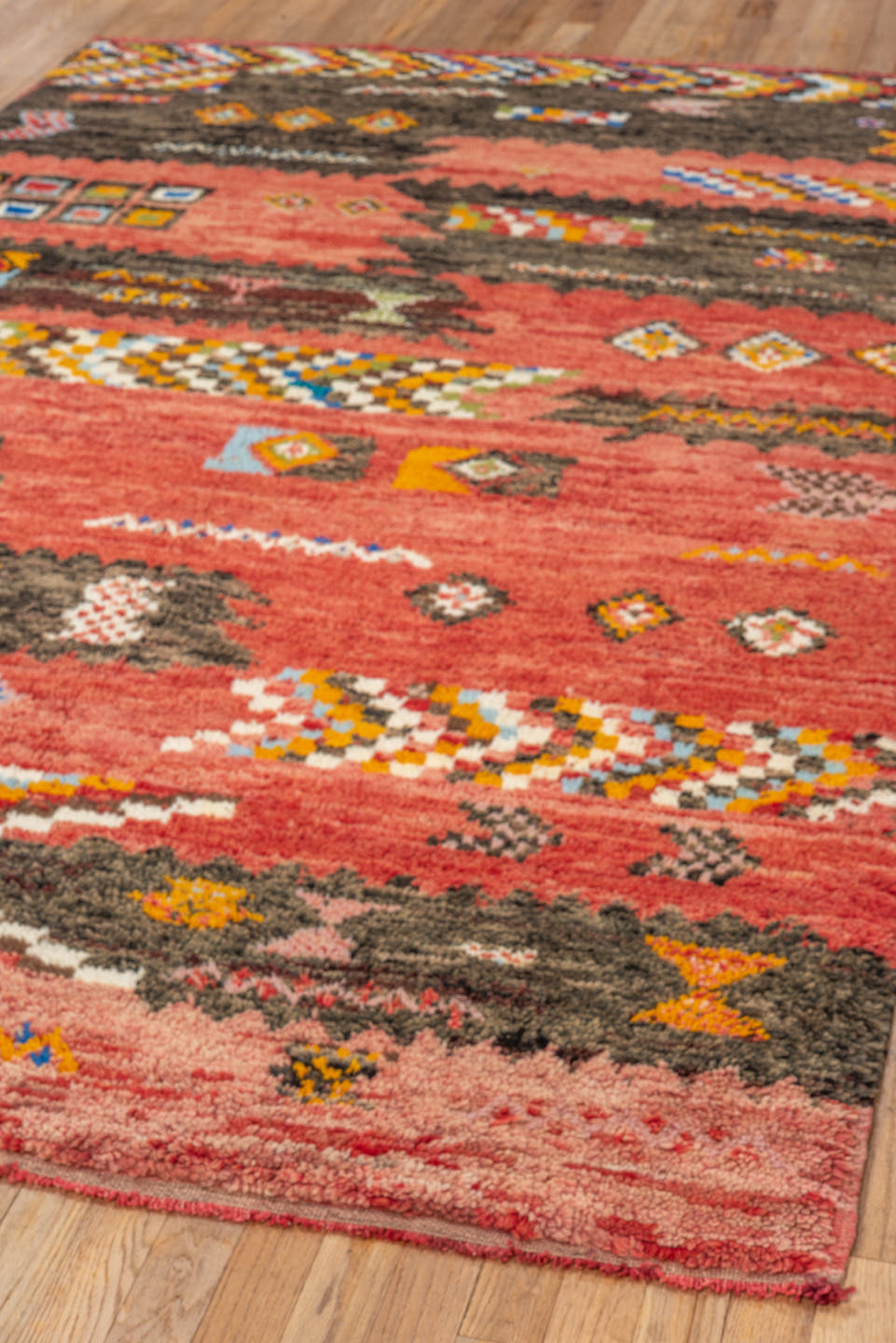 5' x 8' one-of-a-kind handmade vintage Moroccan medium size rug. Color palette: rose, brown, ivory, gold, sky_blue, crimson