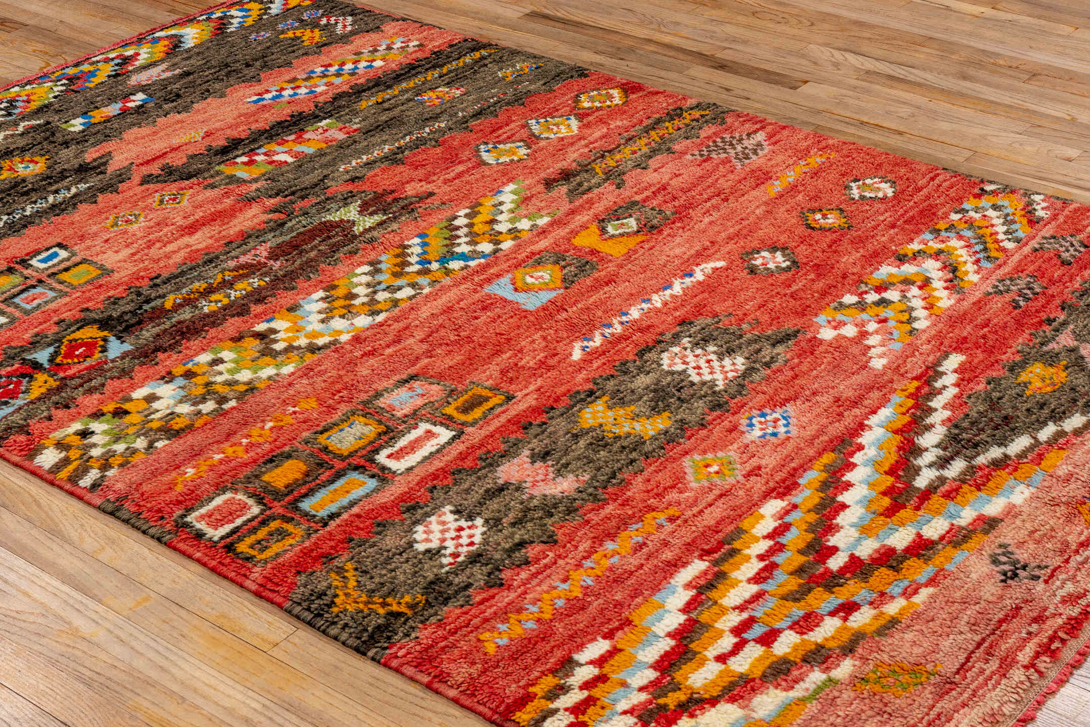 5' x 8' one-of-a-kind handmade vintage Moroccan medium size rug. Color palette: rose, brown, ivory, gold, sky_blue, crimson