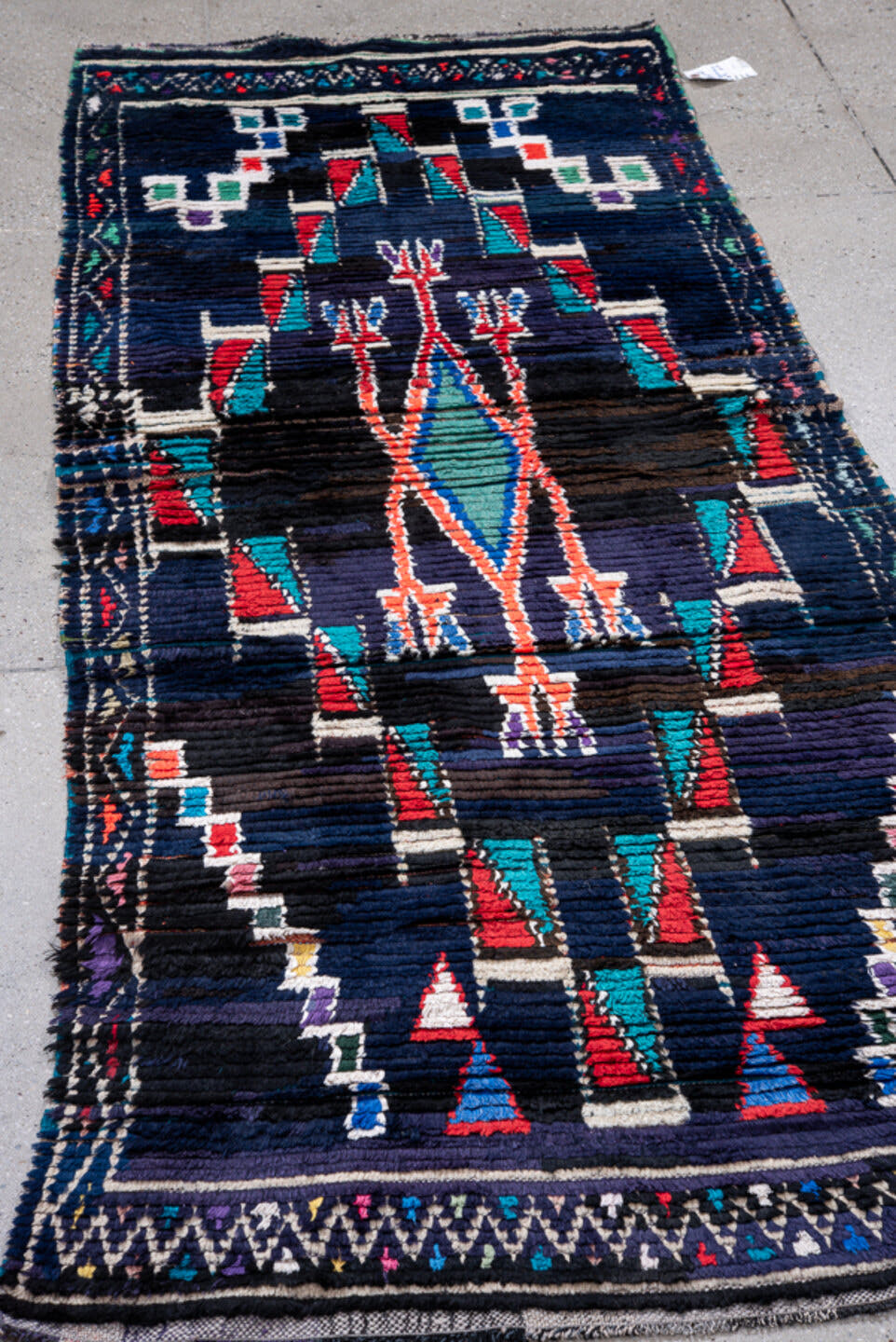 3' x 7' one-of-a-kind handmade vintage Moroccan runner rug. Color palette: navy, black, turquoise, coral, ivory, violet