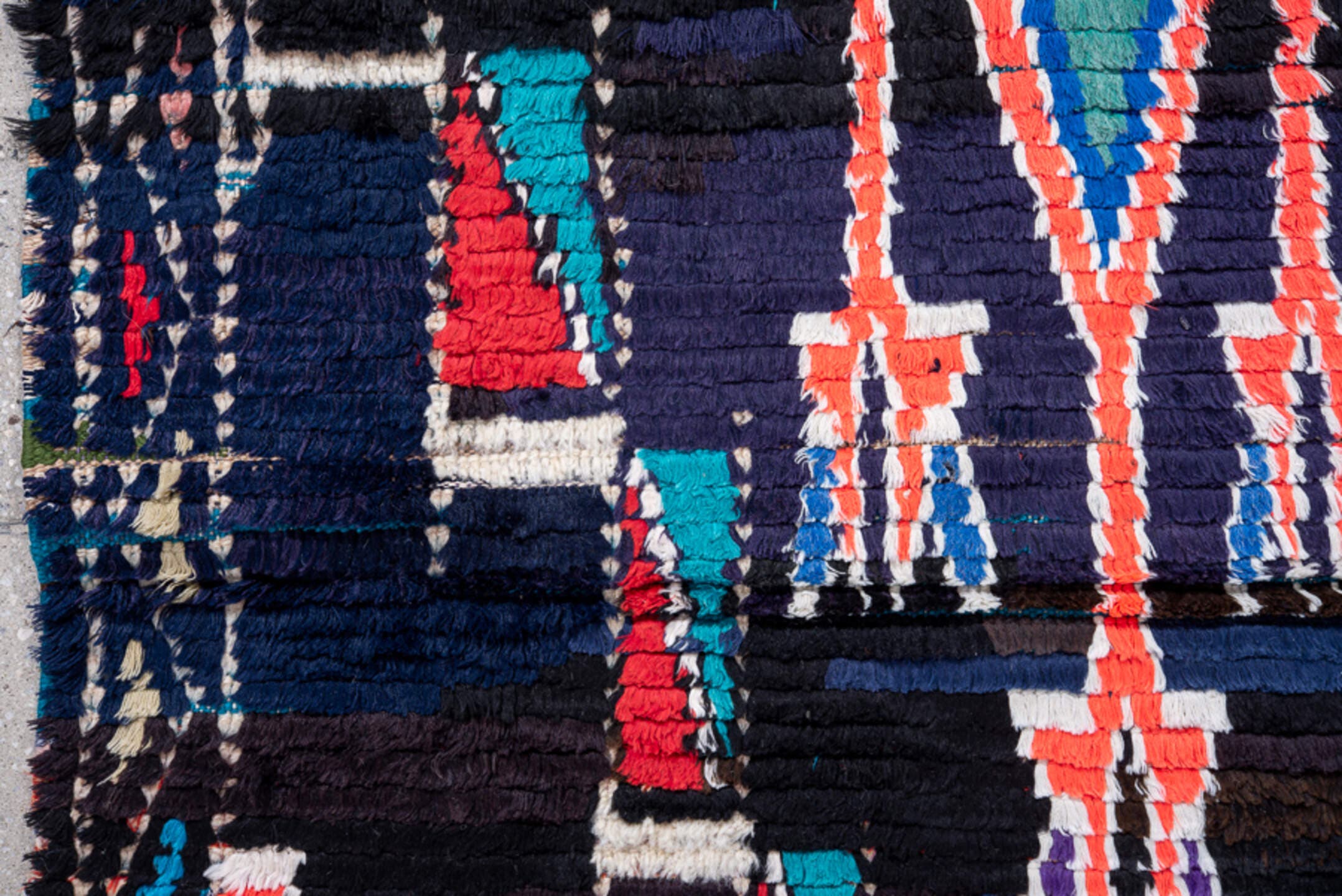 3' x 7' one-of-a-kind handmade vintage Moroccan runner rug. Color palette: navy, black, turquoise, coral, ivory, violet