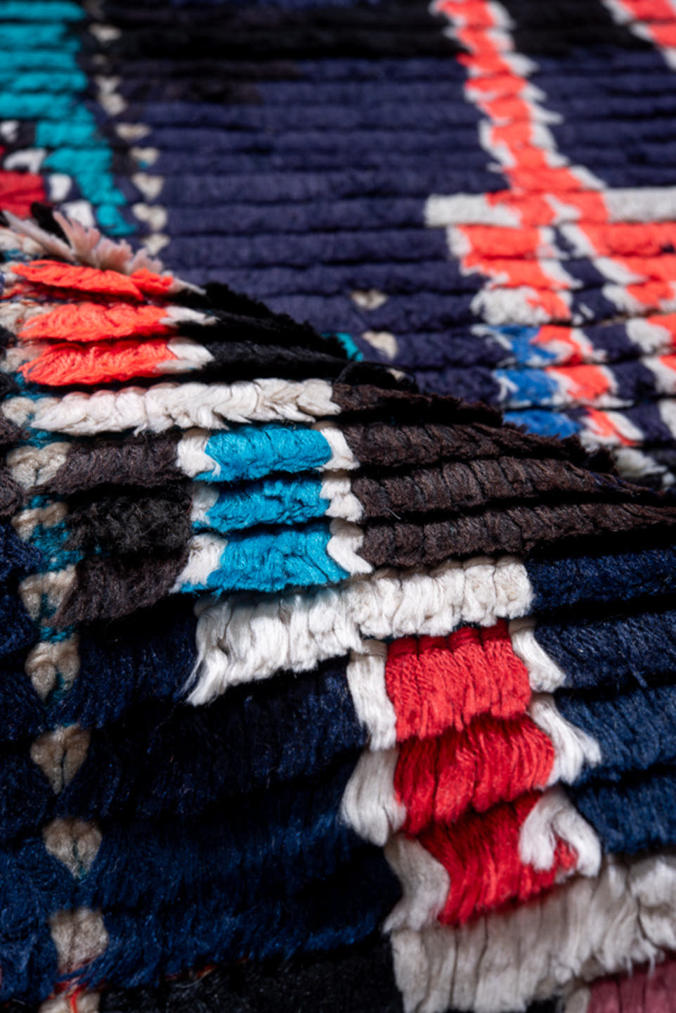 3' x 7' one-of-a-kind handmade vintage Moroccan runner rug. Color palette: navy, black, turquoise, coral, ivory, violet