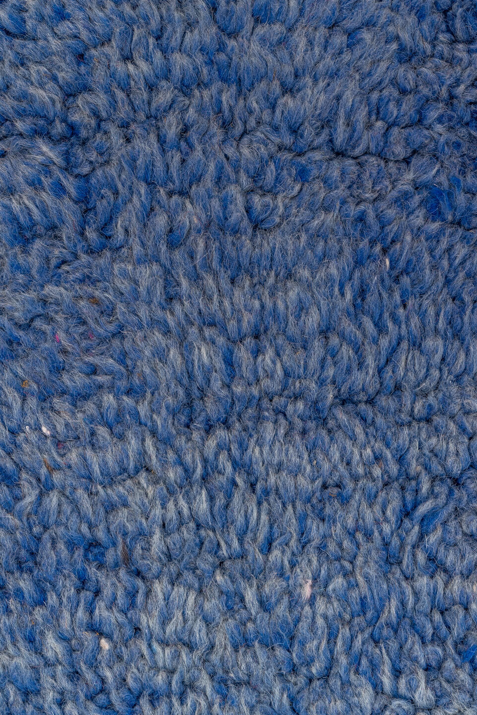 7' x 9' one-of-a-kind handmade antique Moroccan rug. Color palette: blue, cobalt, indigo, purple