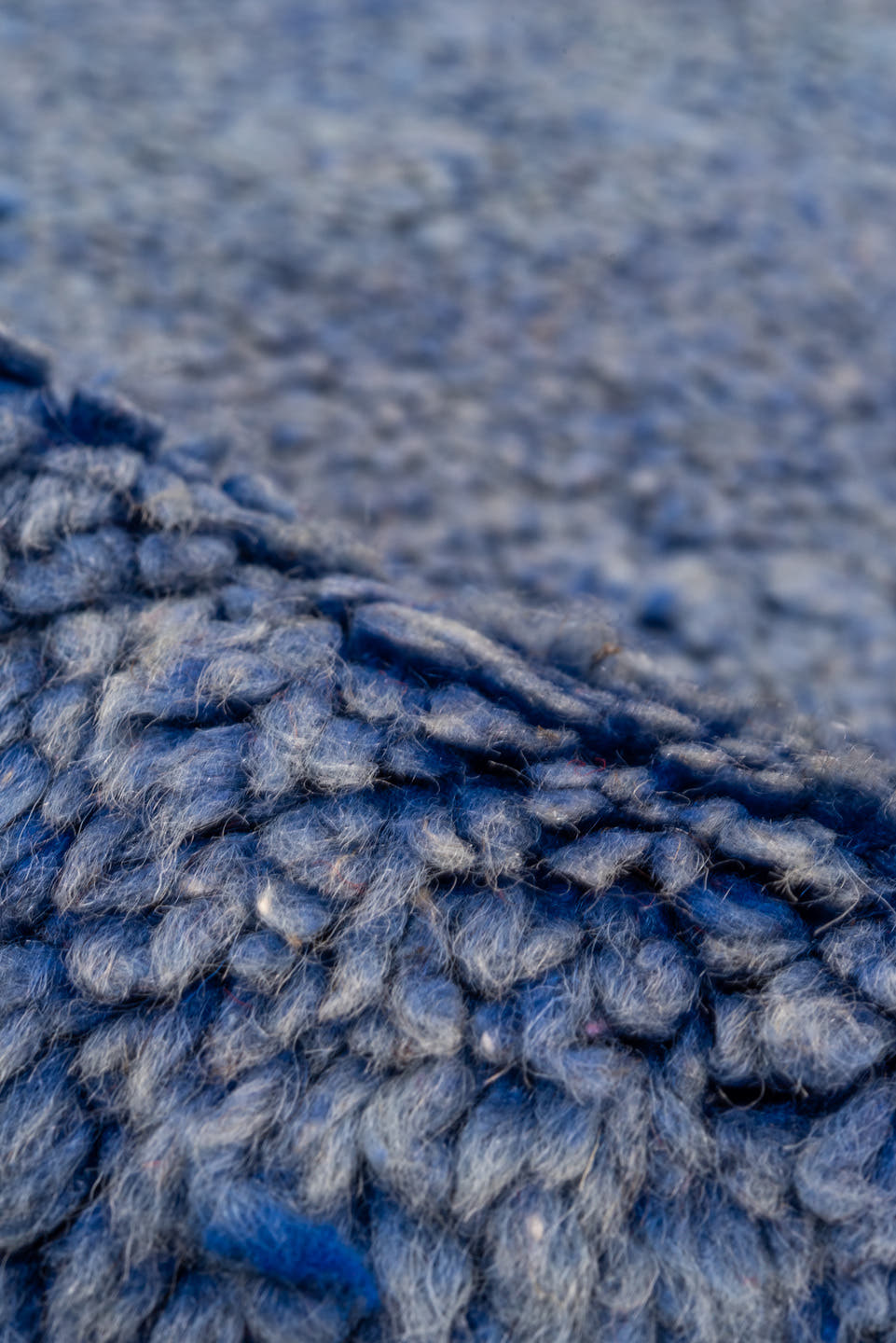 7' x 9' one-of-a-kind handmade antique Moroccan rug. Color palette: blue, cobalt, indigo, purple