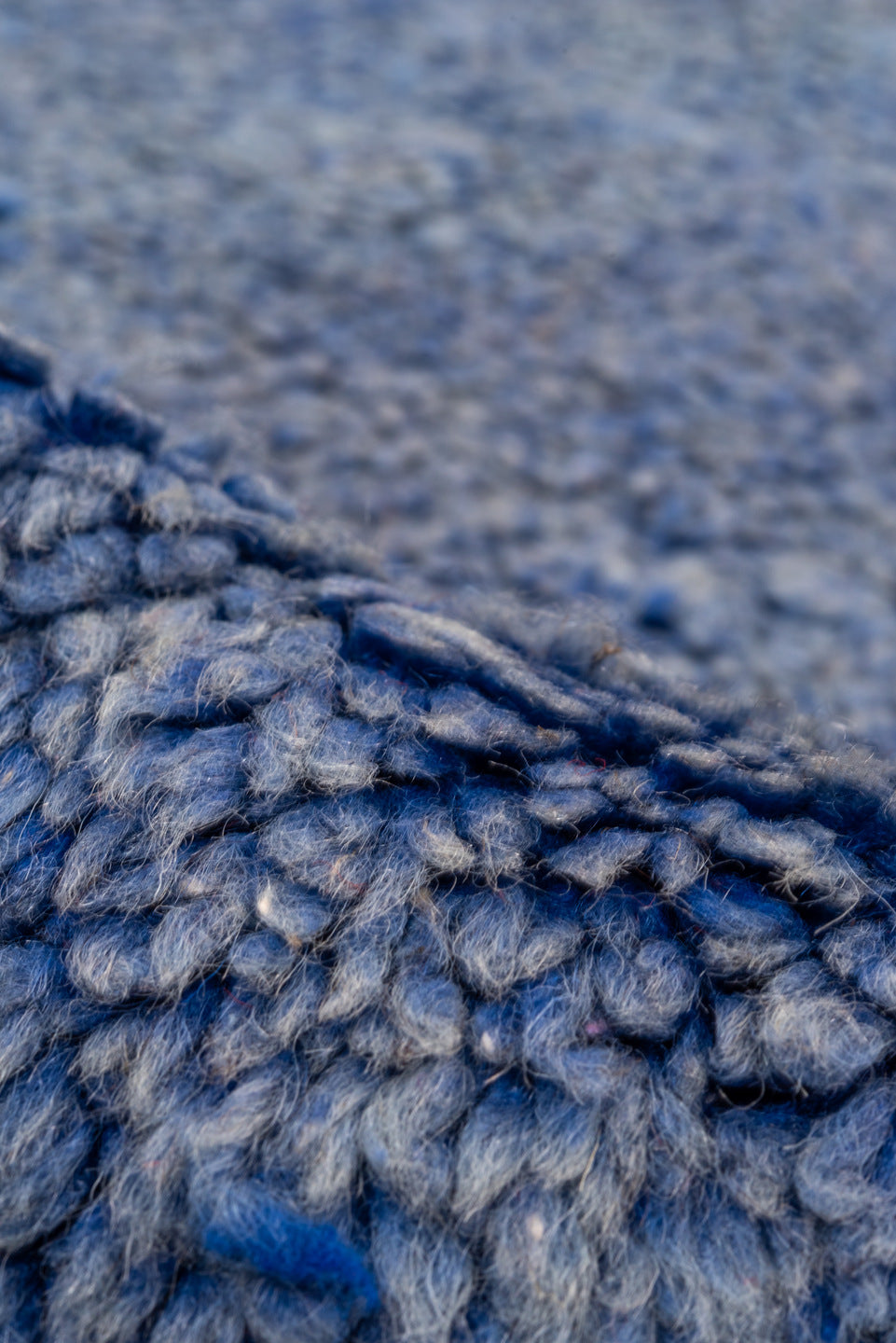 7' x 9' one-of-a-kind handmade antique Moroccan rug. Color palette: blue, cobalt, indigo, purple