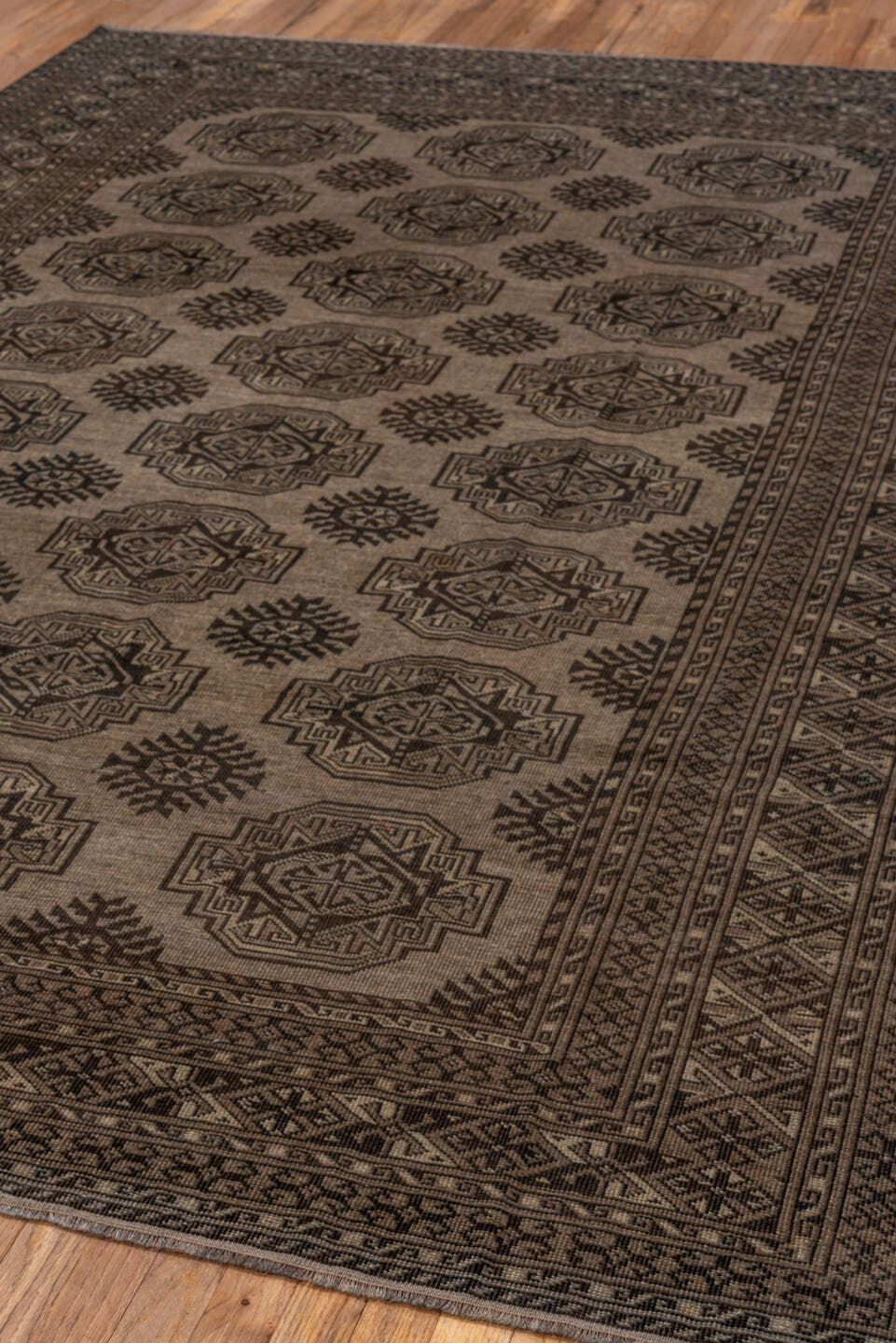 7' x 10' one-of-a-kind handmade antique Afghan large size rug. Color palette: camel, dark brown, taupe, beige, charcoal