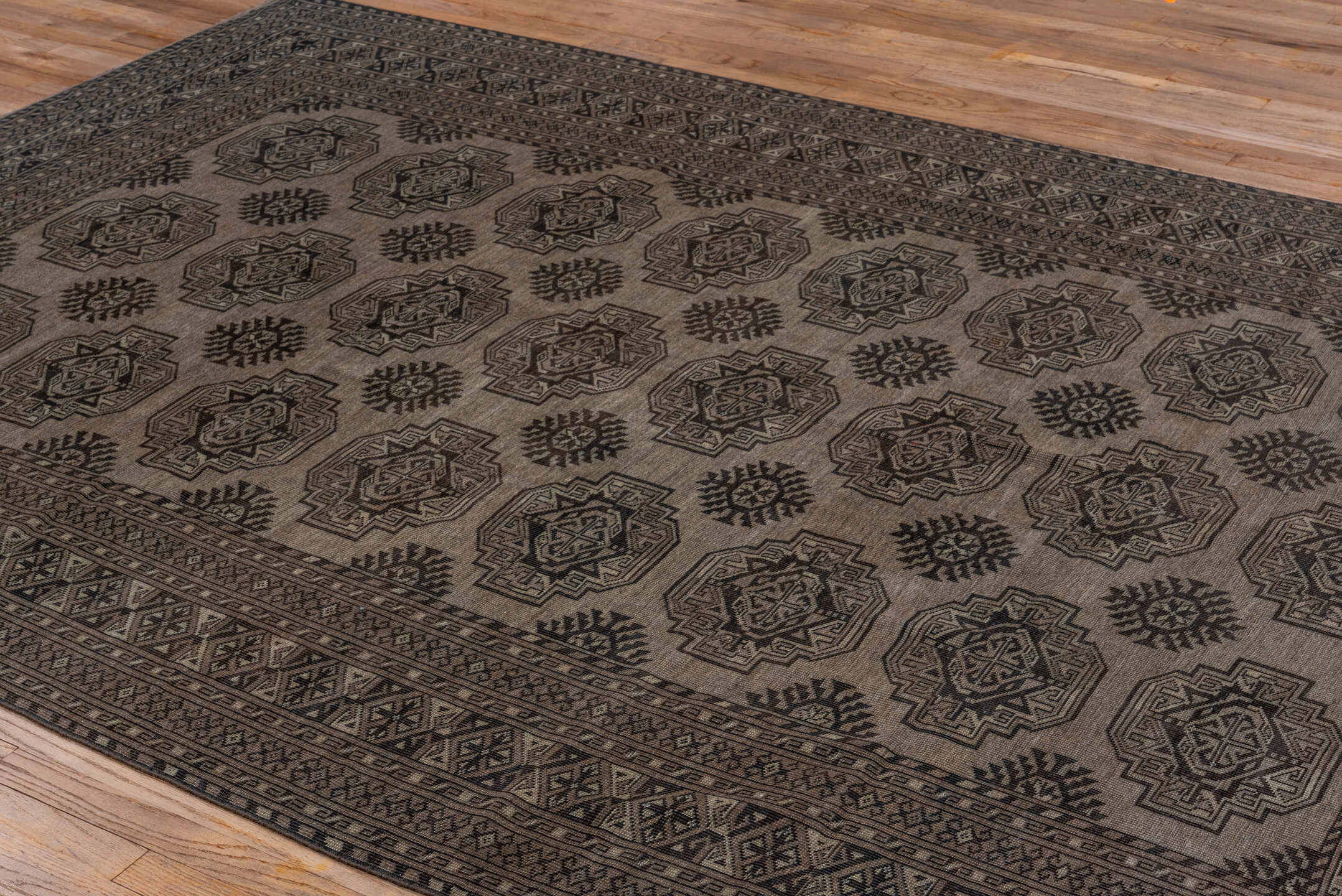 7' x 10' one-of-a-kind handmade antique Afghan large size rug. Color palette: camel, dark brown, taupe, beige, charcoal