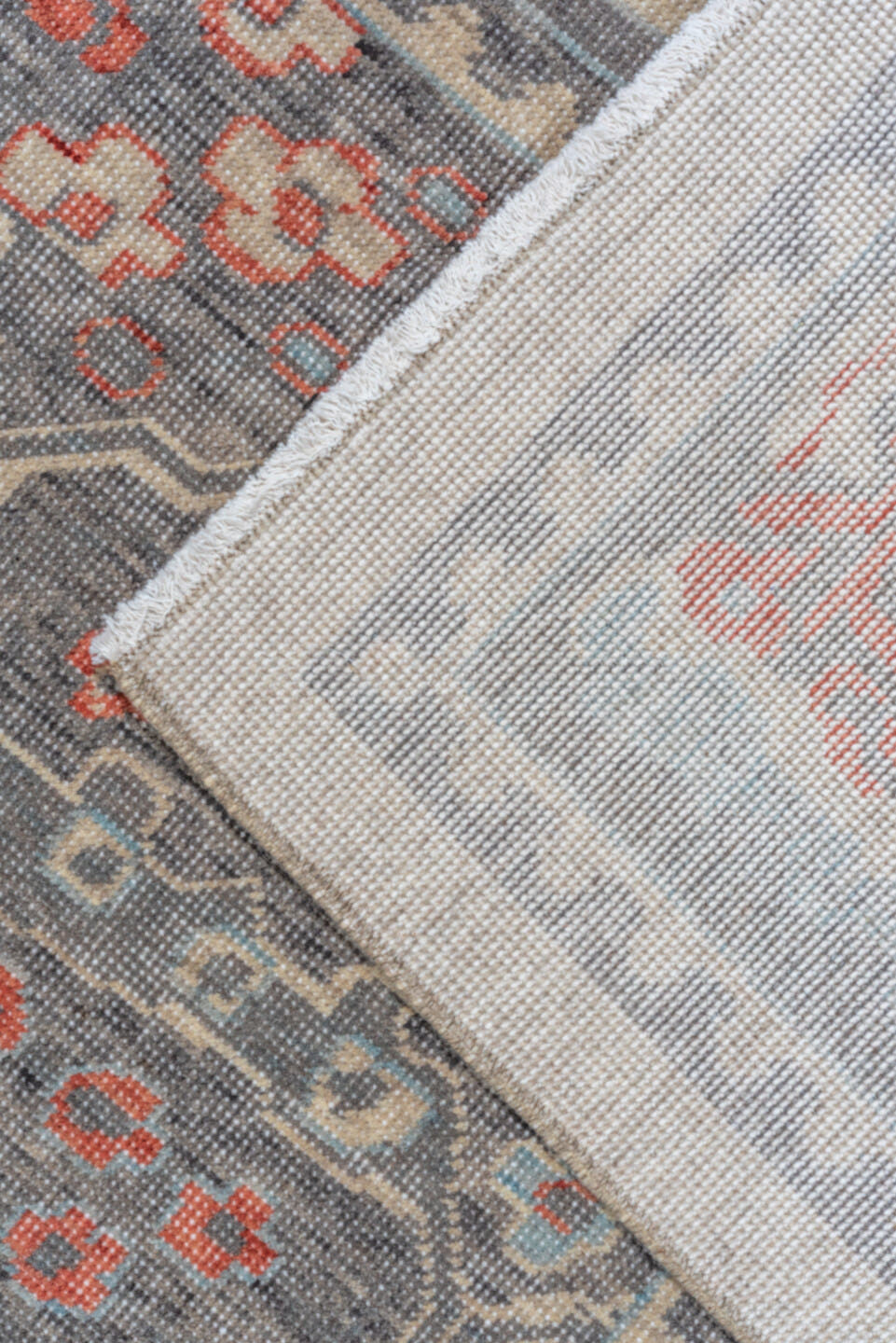 9' x 12' one-of-a-kind handmade machine-made Machine large size rug. Color palette: slate, rust, ivory, blue, taupe