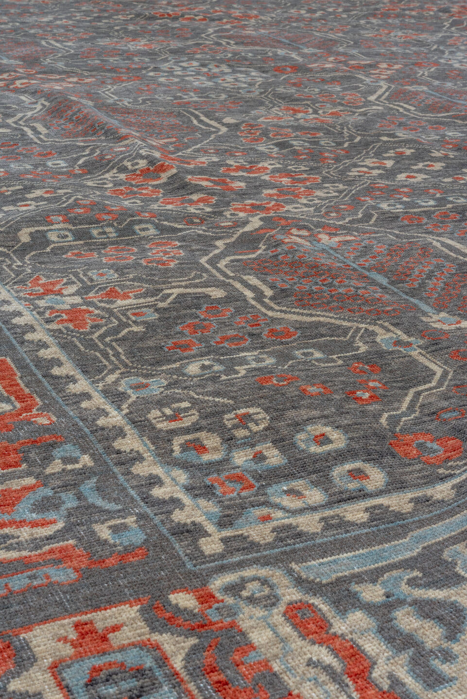9' x 12' one-of-a-kind handmade machine-made Machine large size rug. Color palette: slate, rust, ivory, blue, taupe